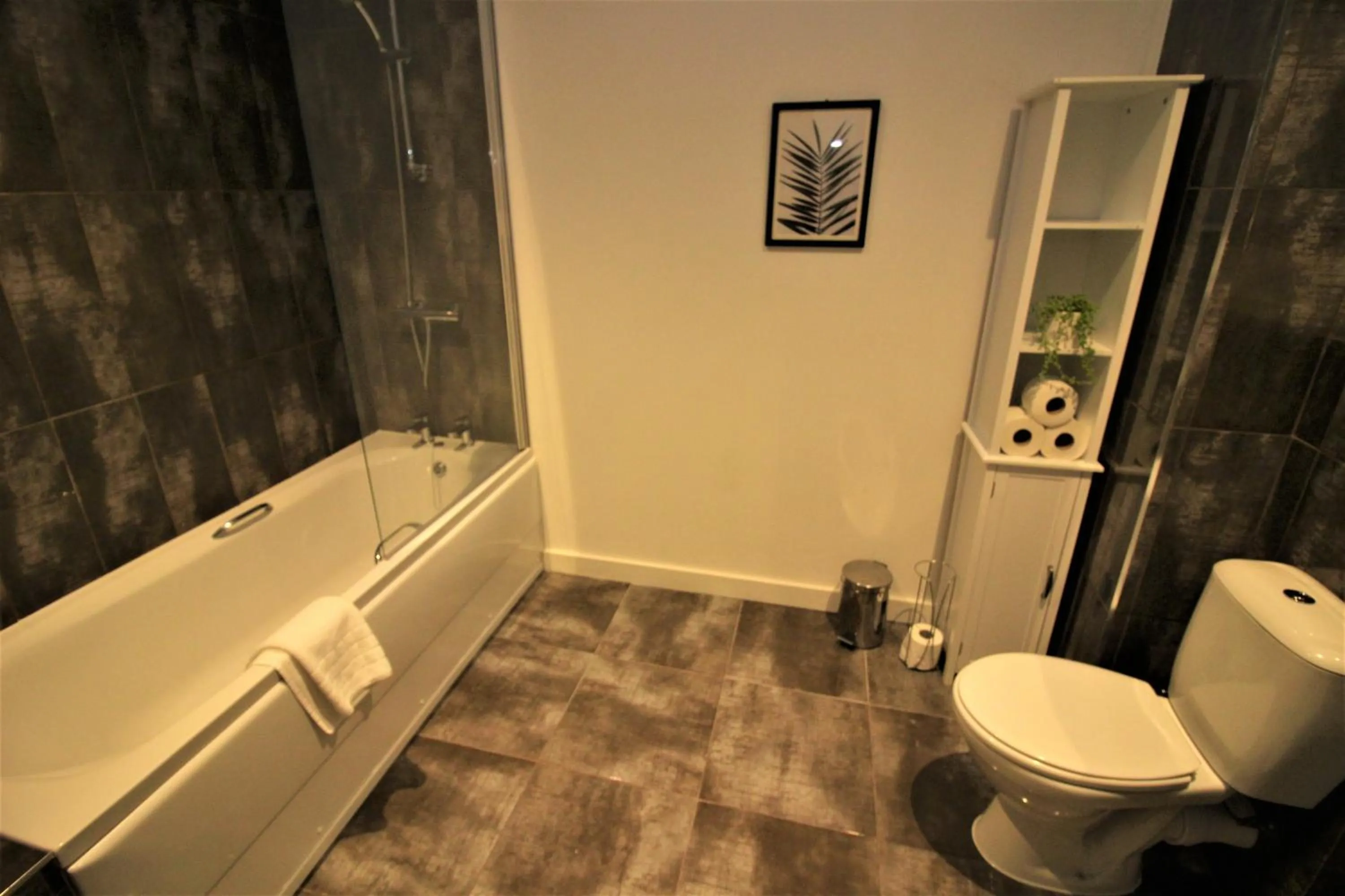 Bathroom in City Suites by Guestz