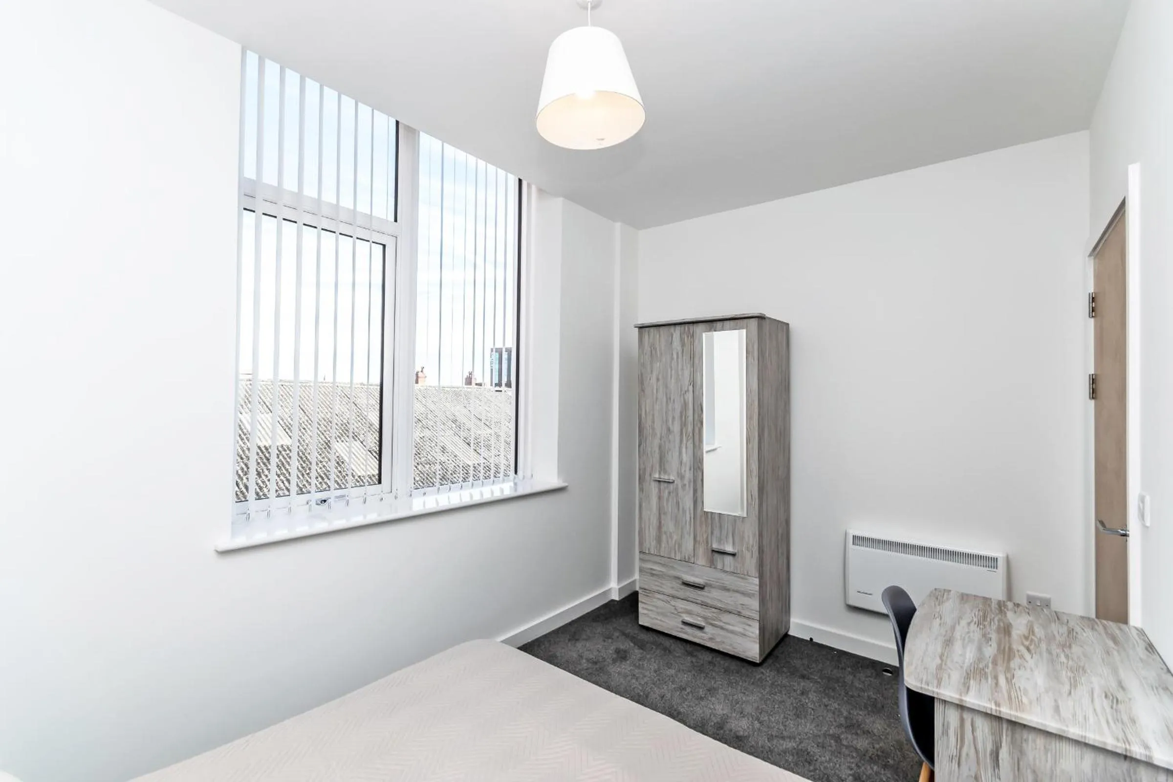 Bedroom in City Suites by Guestz