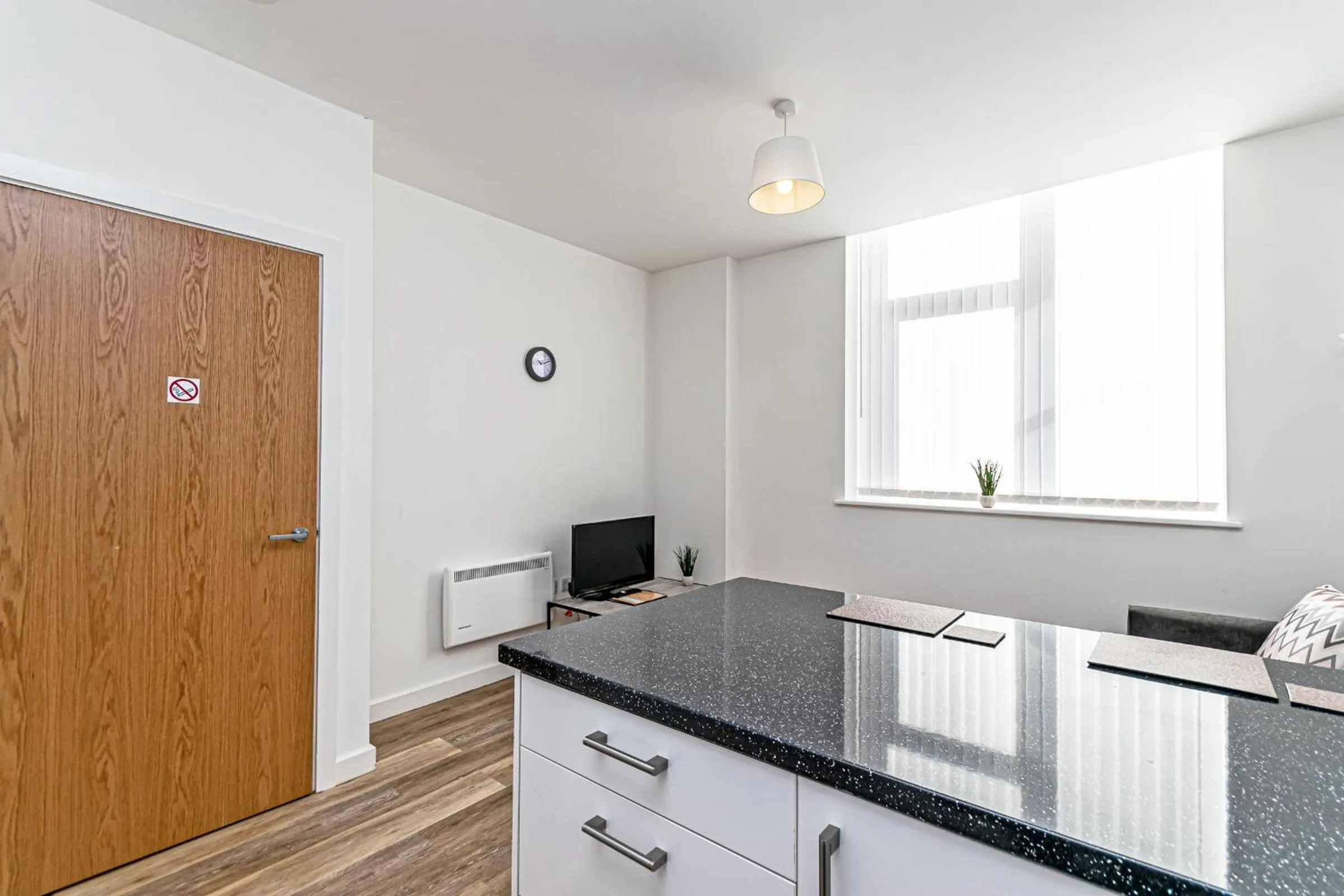 Kitchen or kitchenette in City Suites by Guestz