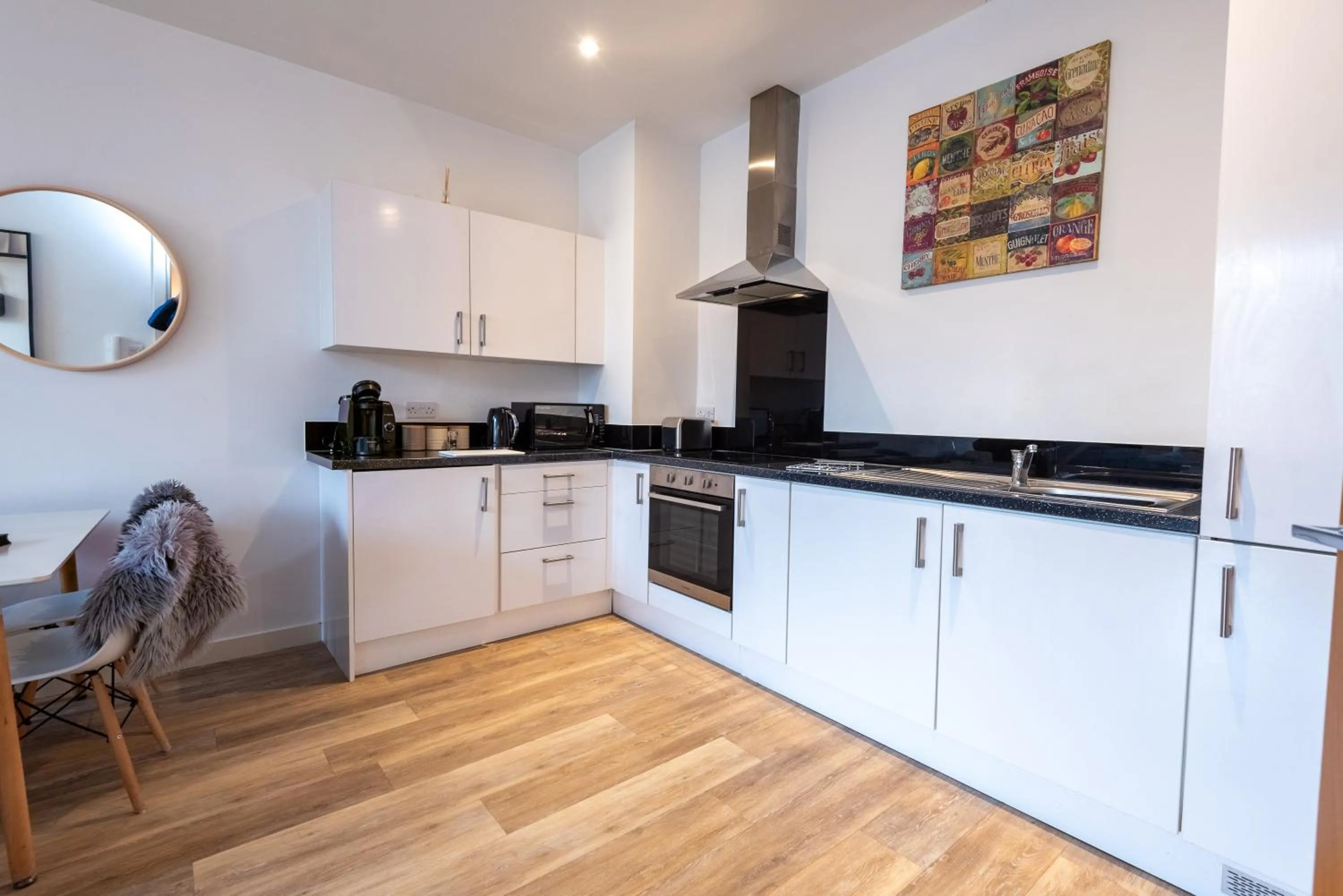 Kitchen or kitchenette in City Suites by Guestz