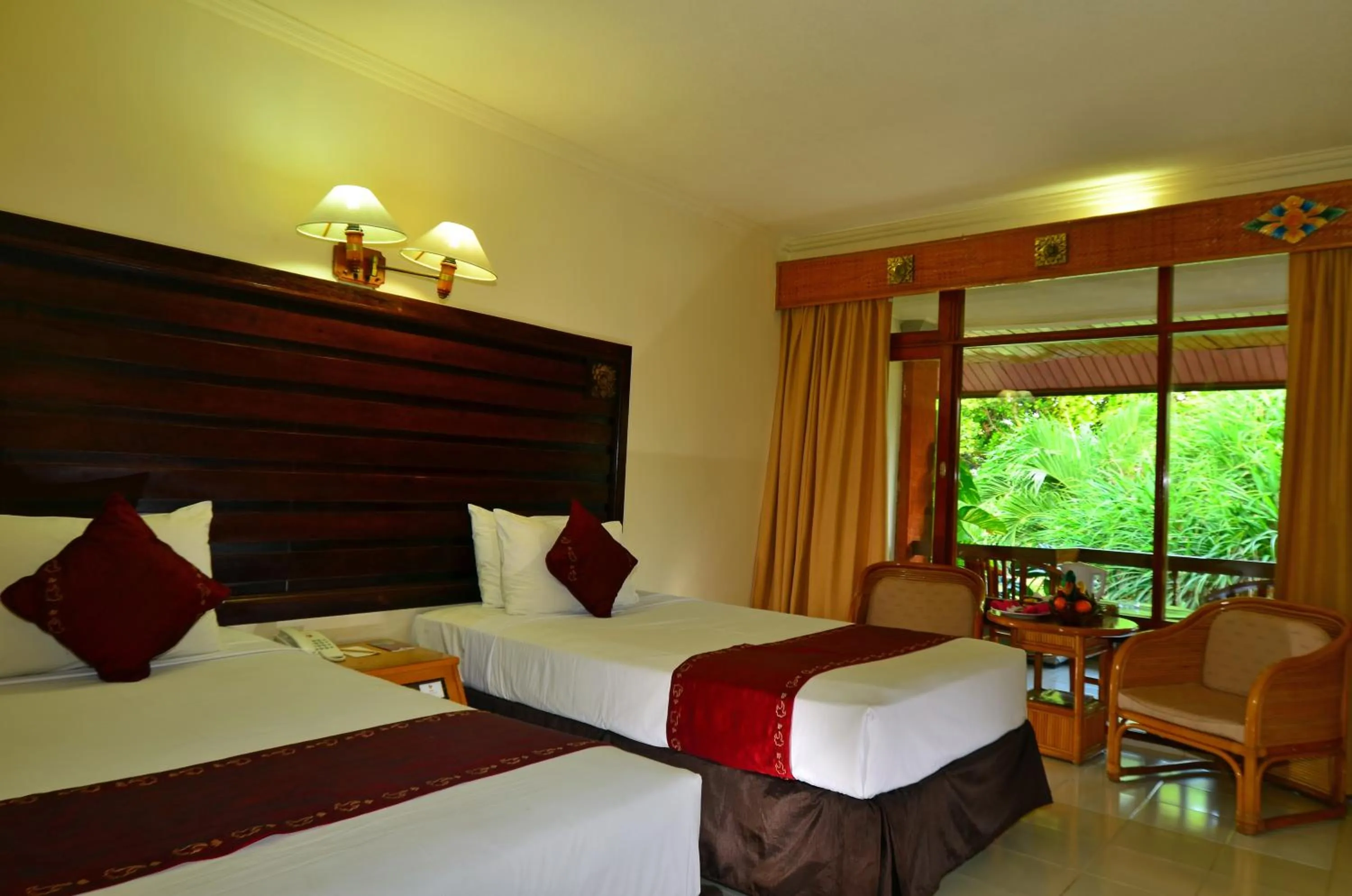 Bedroom, Bed in Inna Sindhu Beach Hotel & Resort