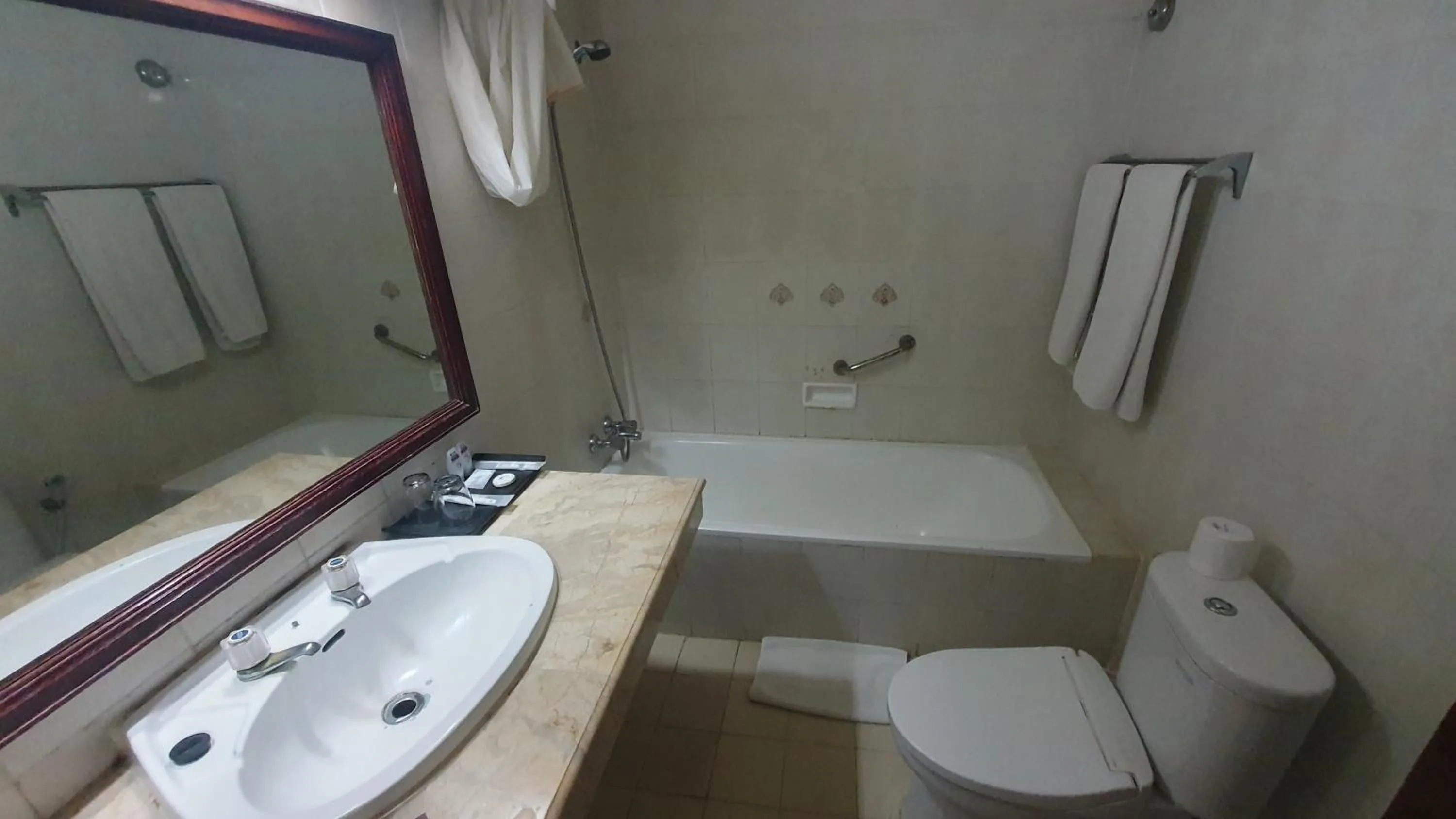 Bathroom in Inna Sindhu Beach Hotel & Resort