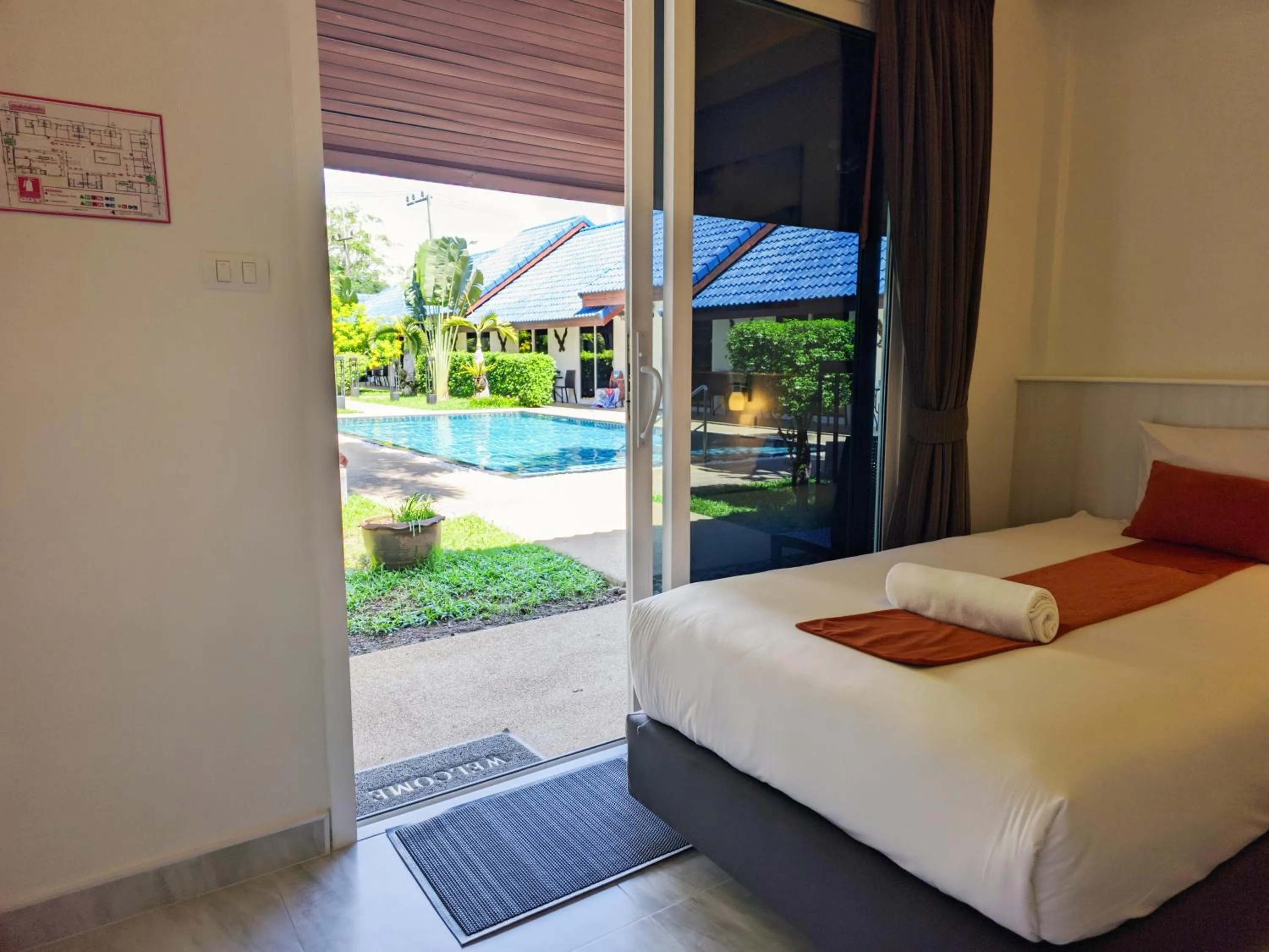 Pool view, Bed in Phuket Airport Hotel - SHA Extra Plus