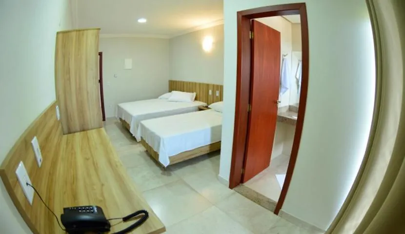 Bed in Dallas Palace Hotel