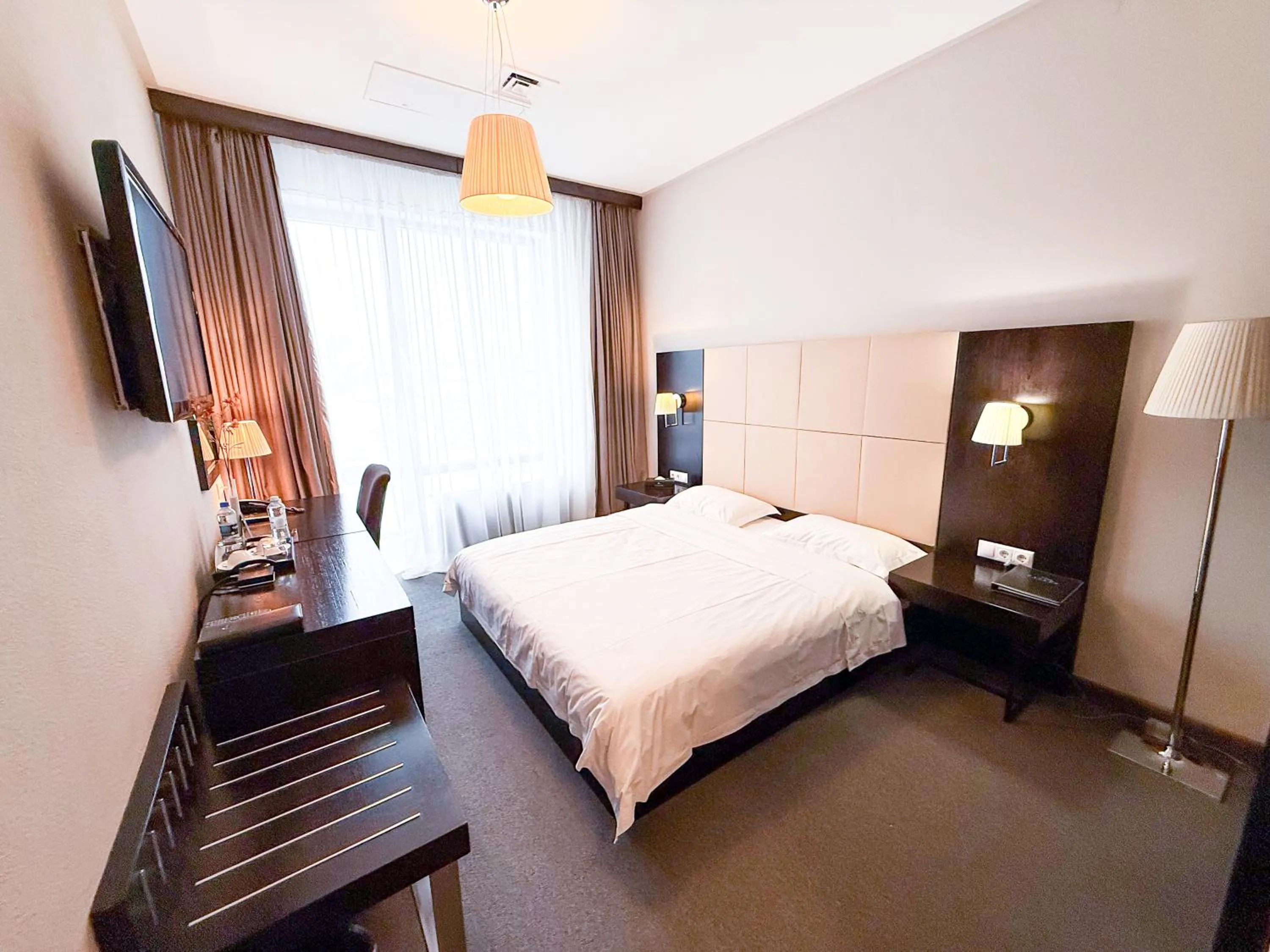 Bed in Voyage Hotel