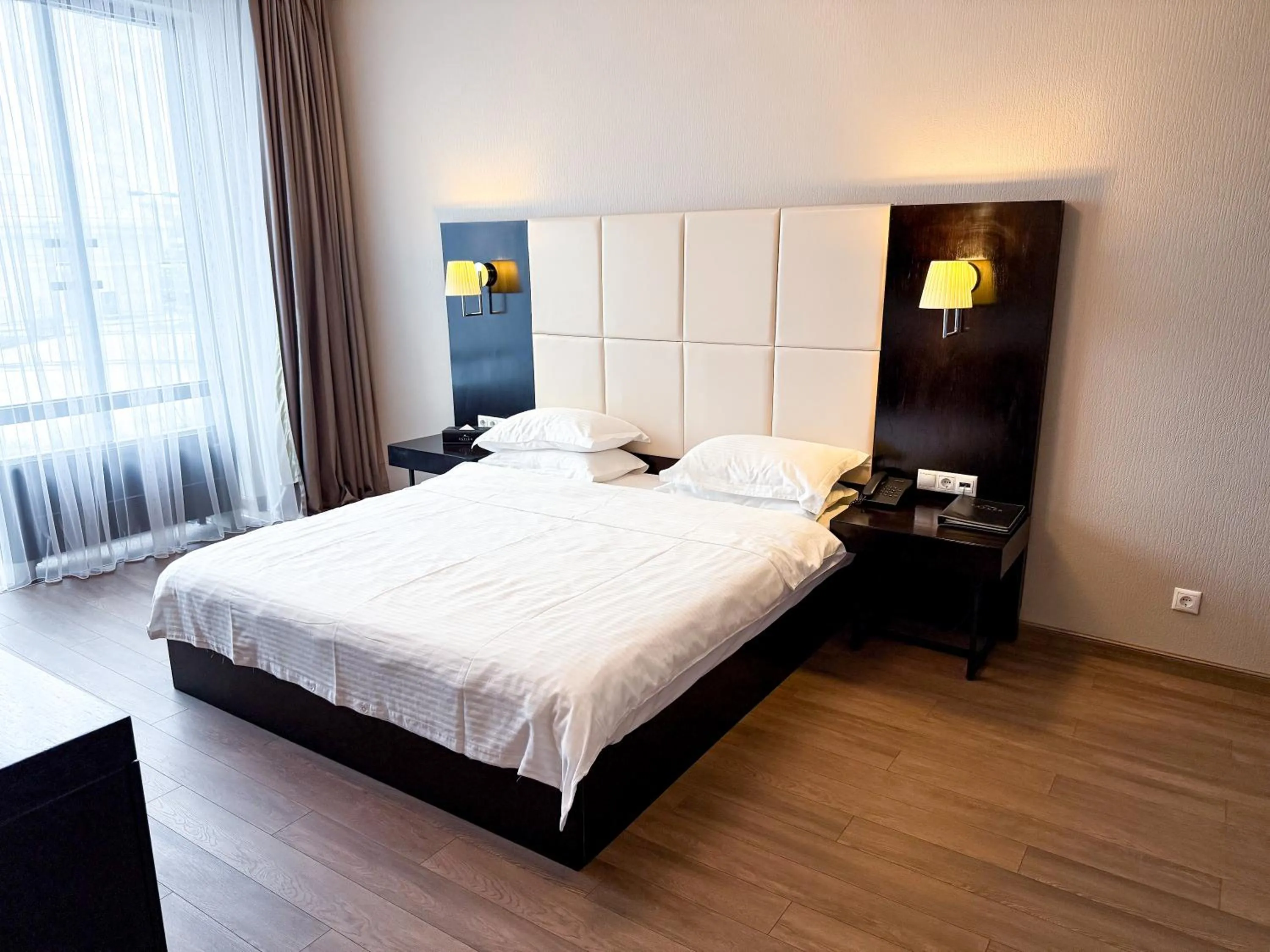 Bed in Voyage Hotel