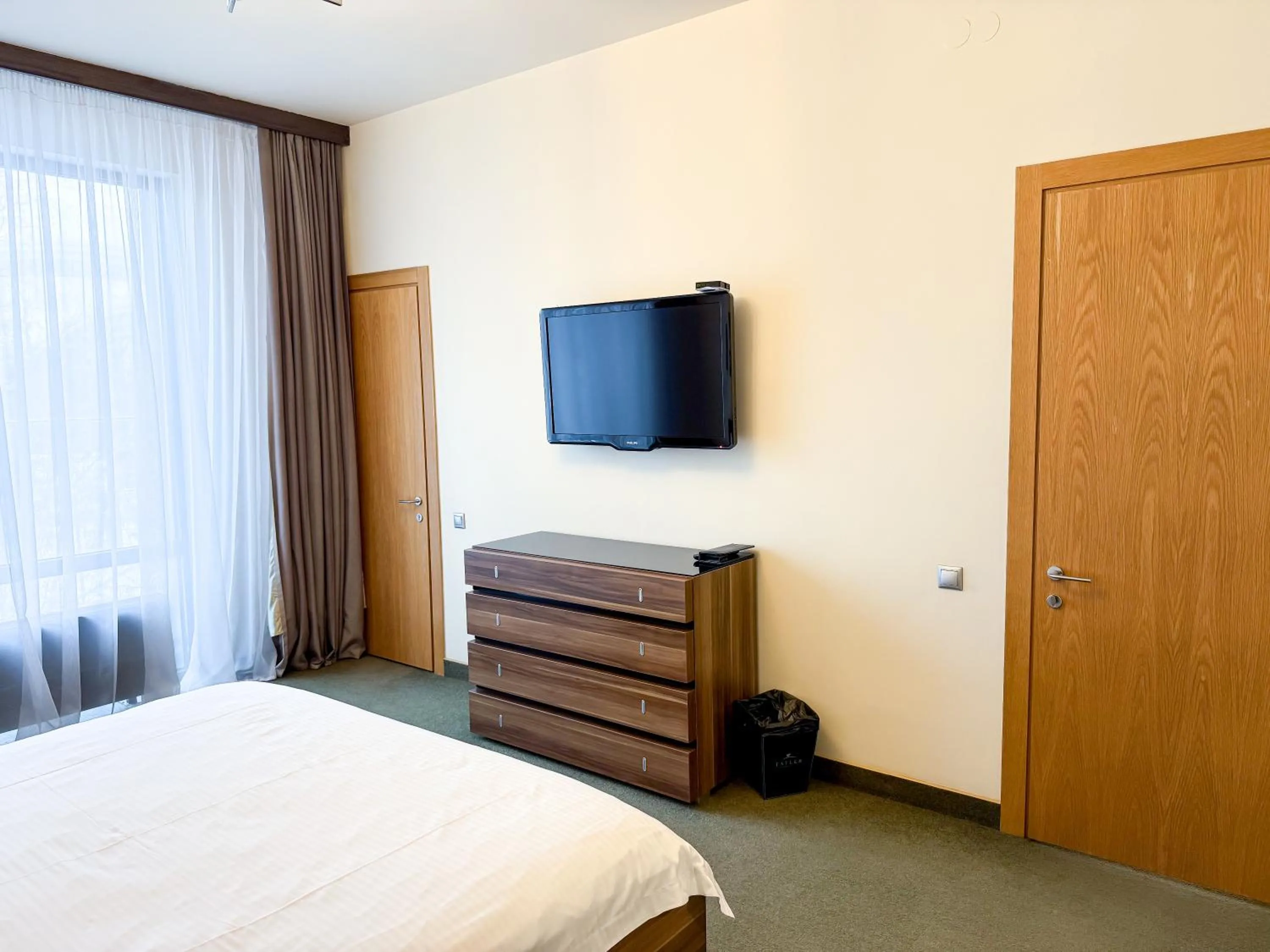 Bed in Voyage Hotel