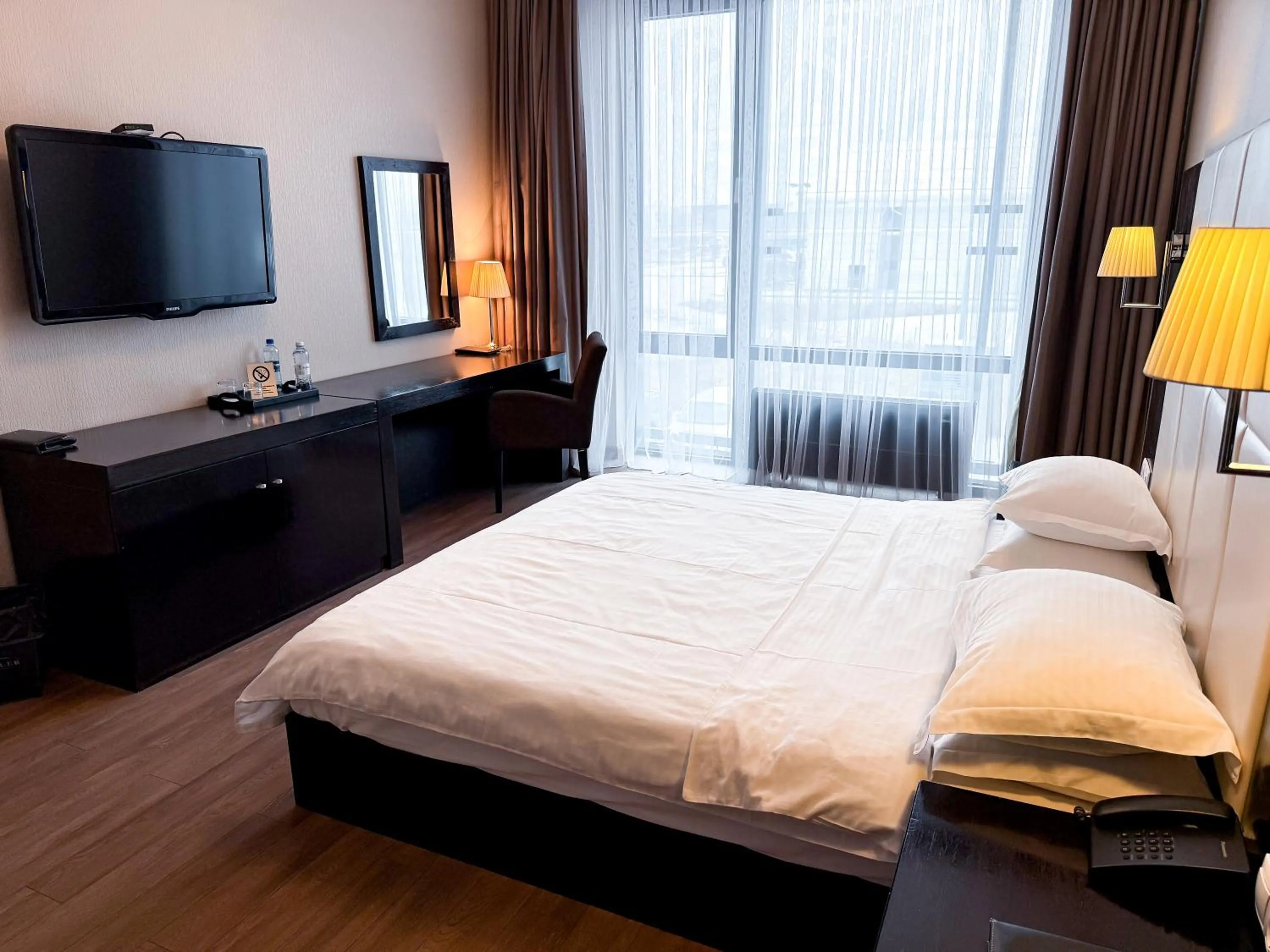 Bed in Voyage Hotel