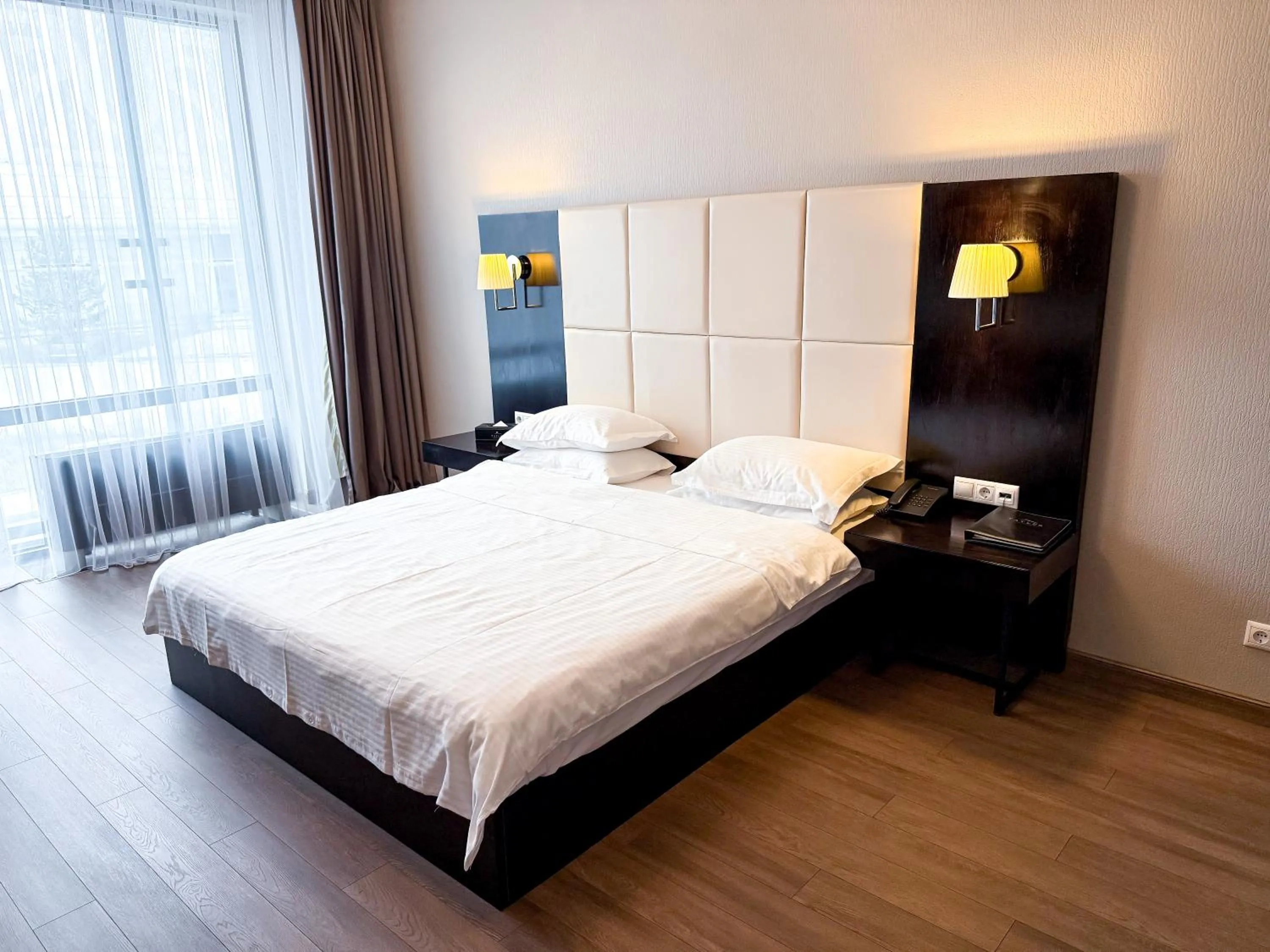 Bed in Voyage Hotel