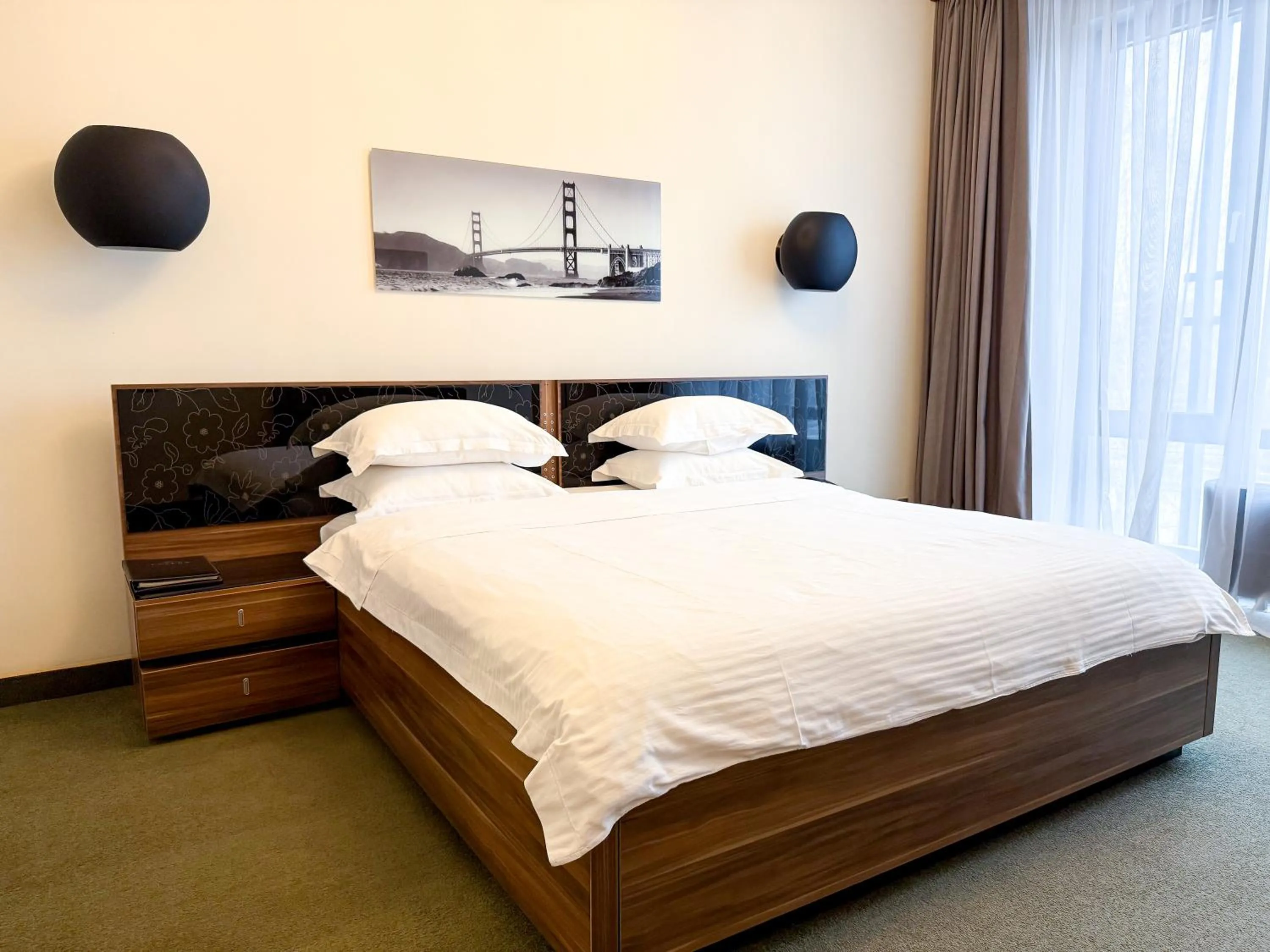 Bed in Voyage Hotel