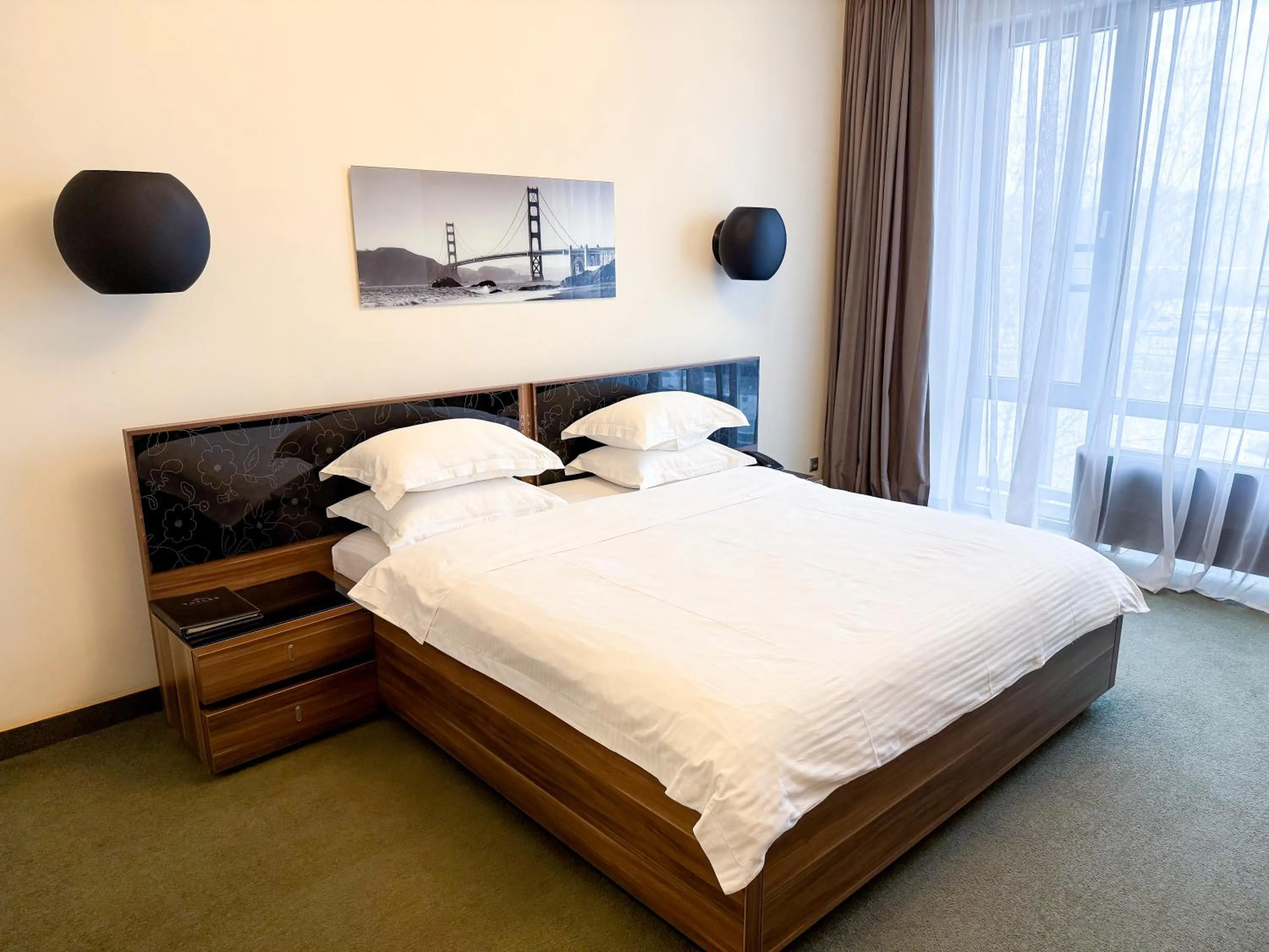 Bed in Voyage Hotel
