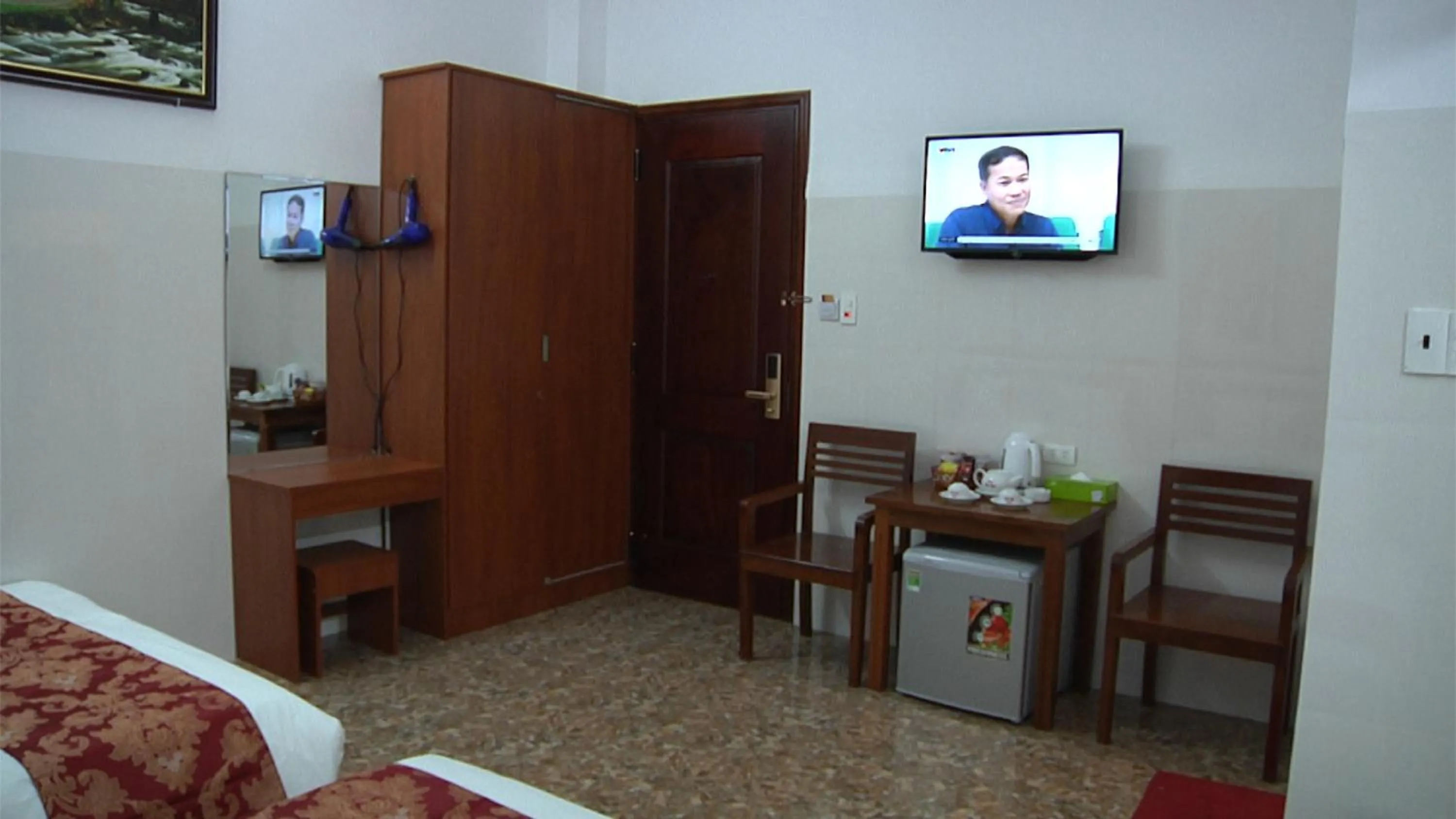Communal lounge/ TV room, Bed in KHÁCH SẠN MỸ NGỌC