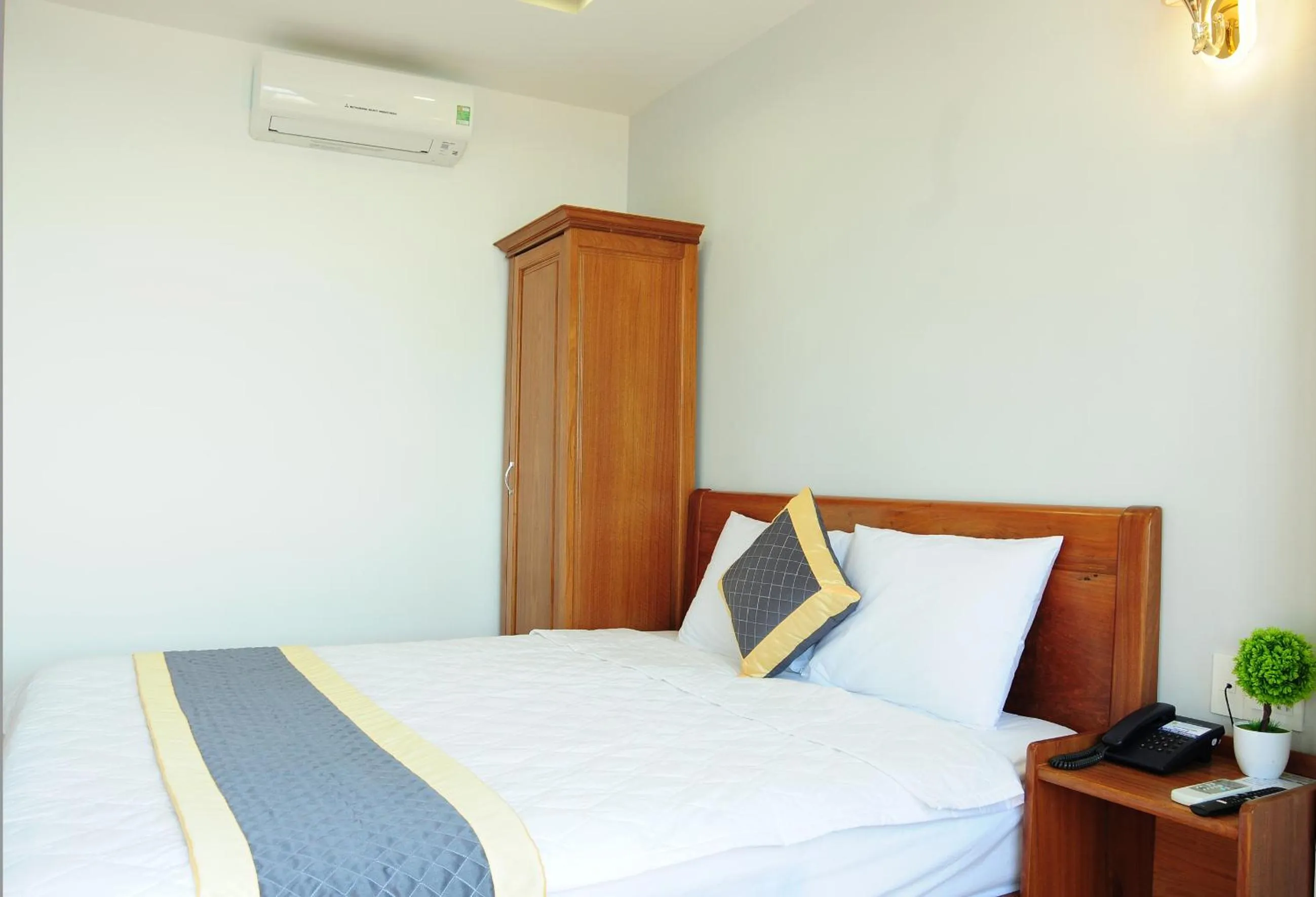 Bed in SEASIDE HOTEL