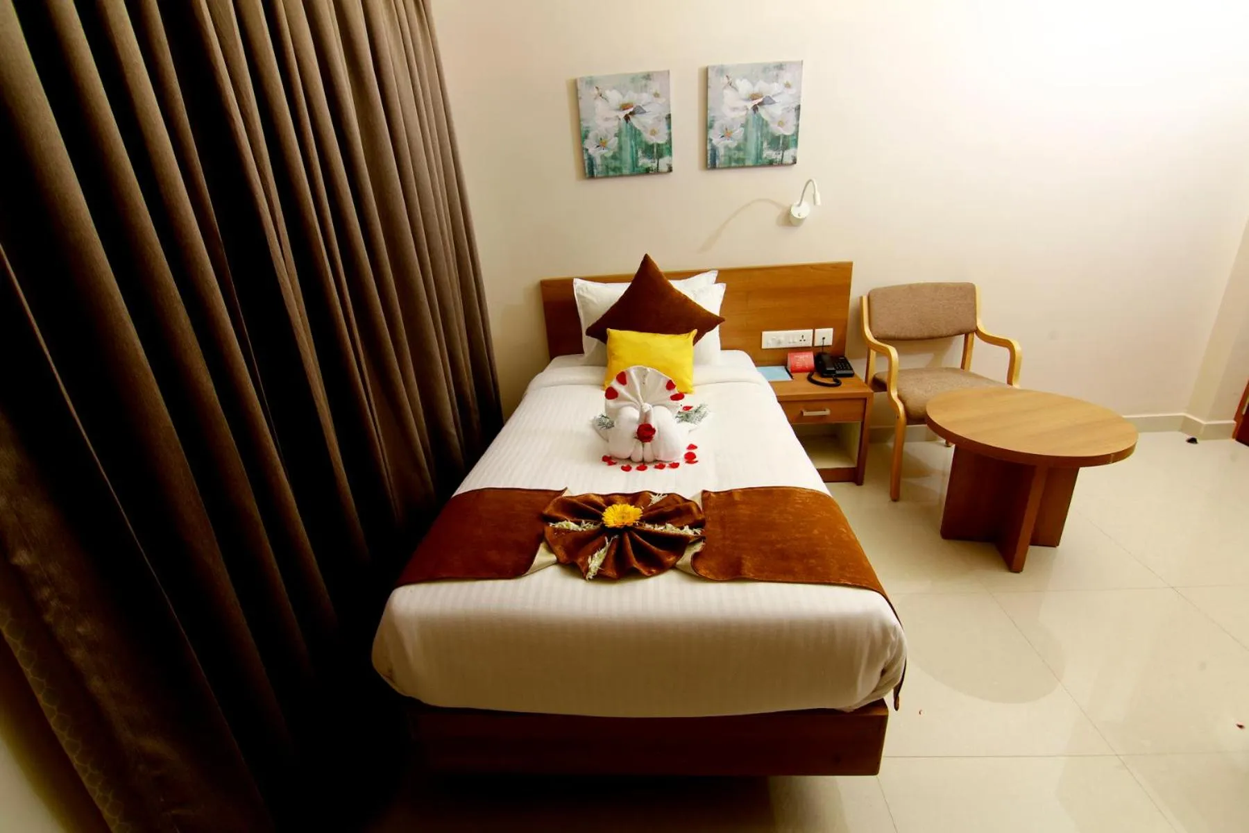 Bed in HOTEL PANACEA VENTURES