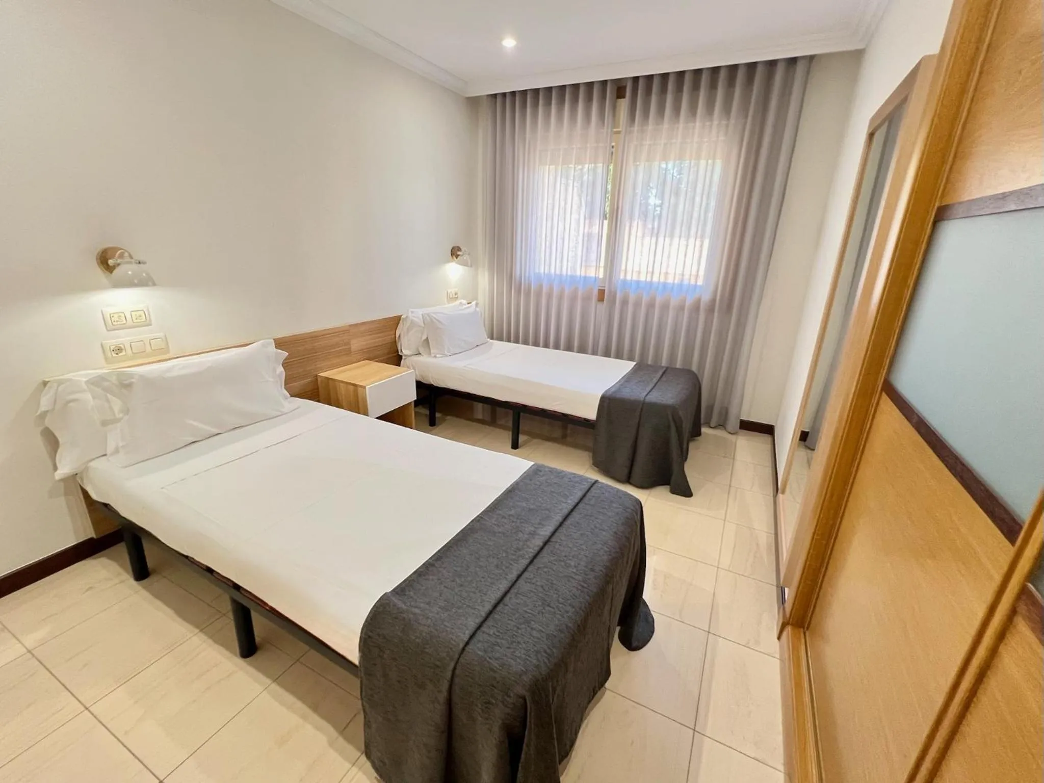 Bed in Apartamentos Mediterráneo Real