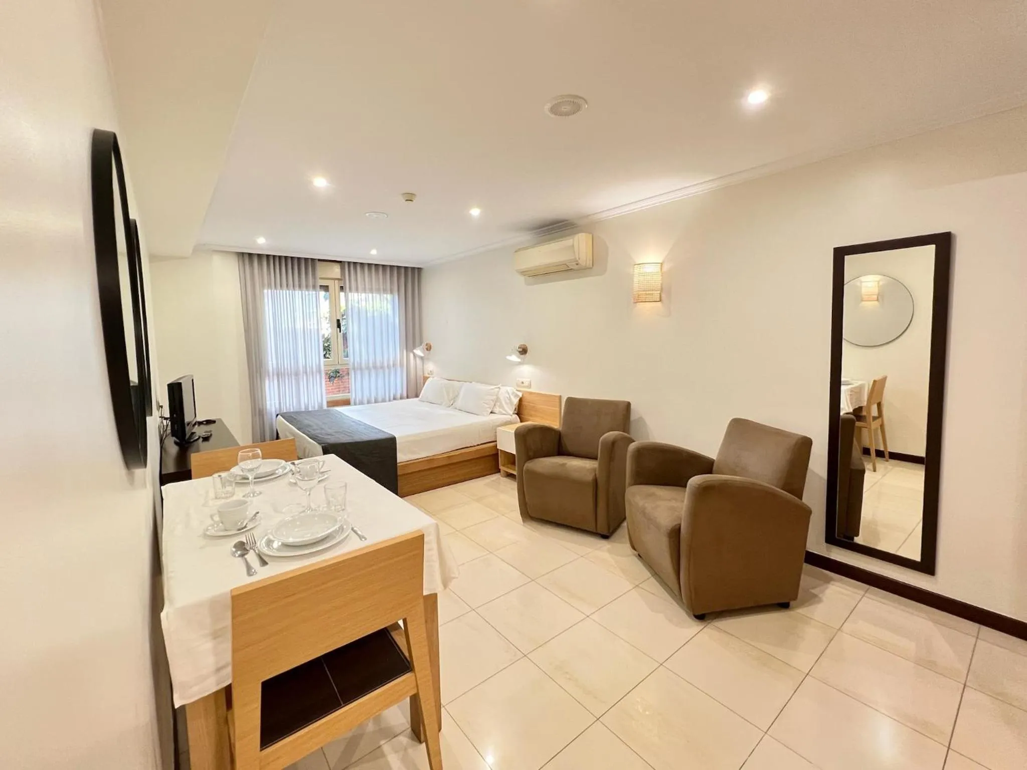 TV and multimedia in Apartamentos Mediterráneo Real