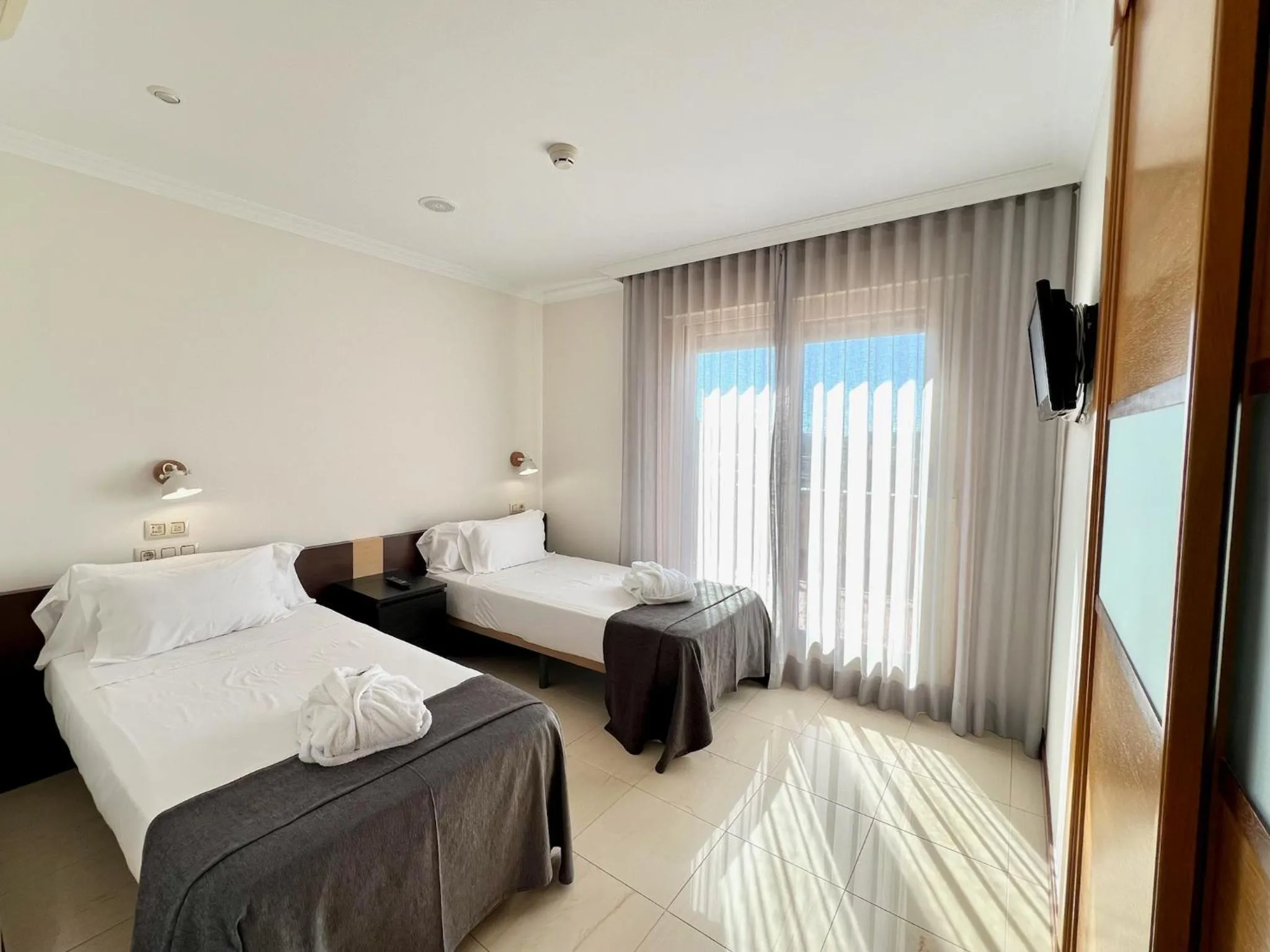 Bed in Apartamentos Mediterráneo Real