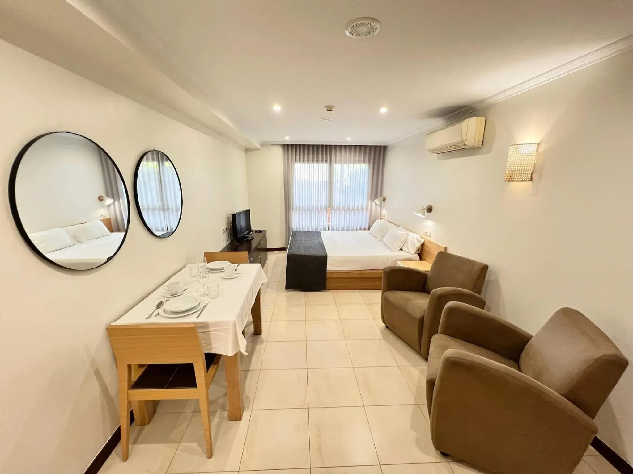 TV and multimedia, Bed in Apartamentos Mediterráneo Real TV and multimedia, Bed in Apartamentos Mediterráneo Real