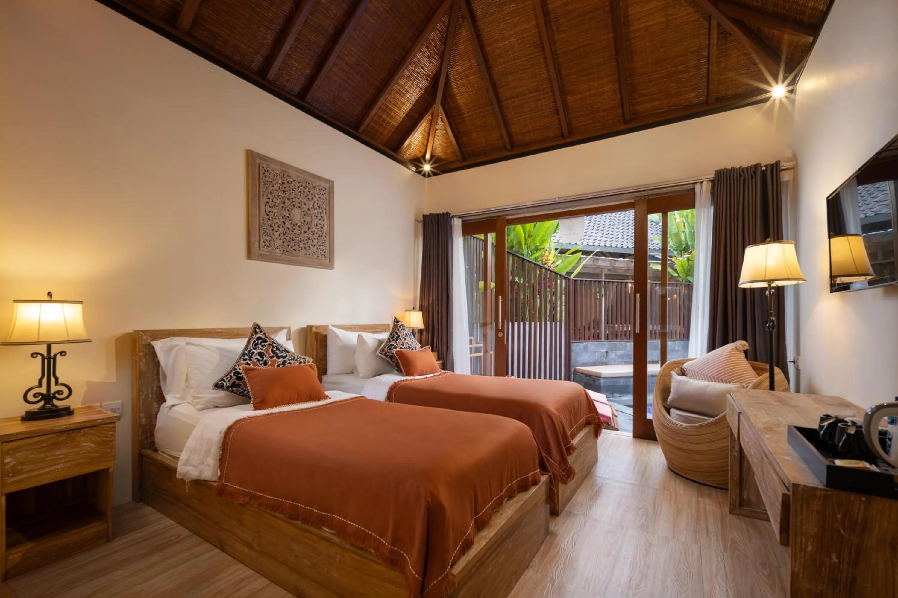 Bed in Pradja Slumbung Villas