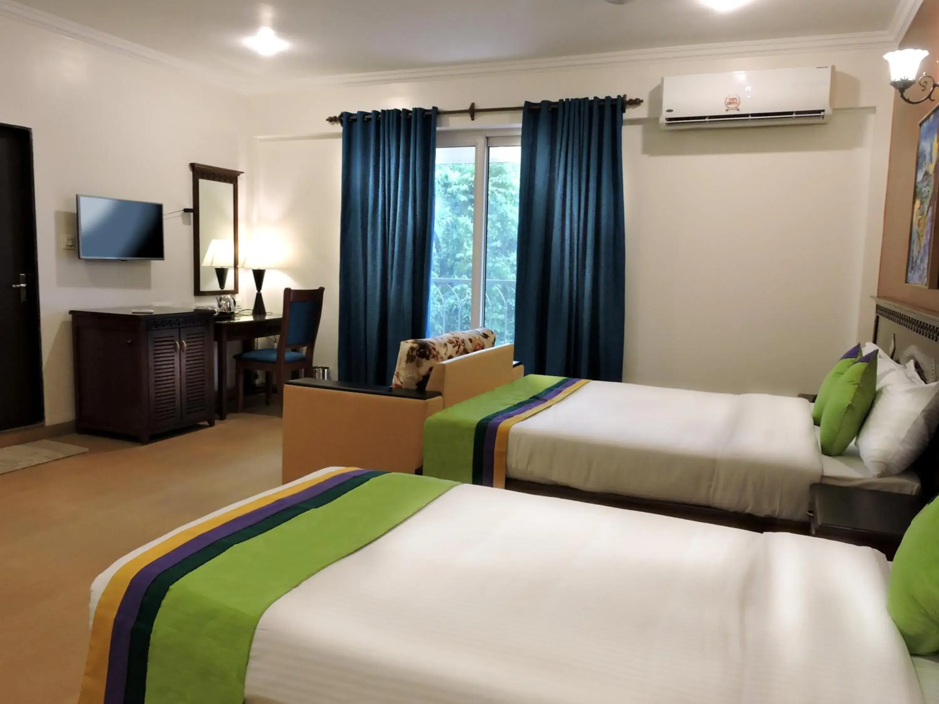 Bedroom, Bed in Treebo Premium Dona Eliza, 700 metres from Calangute Beach Bedroom, Bed in Treebo Premium Dona Eliza, 700 metres from Calangute Beach