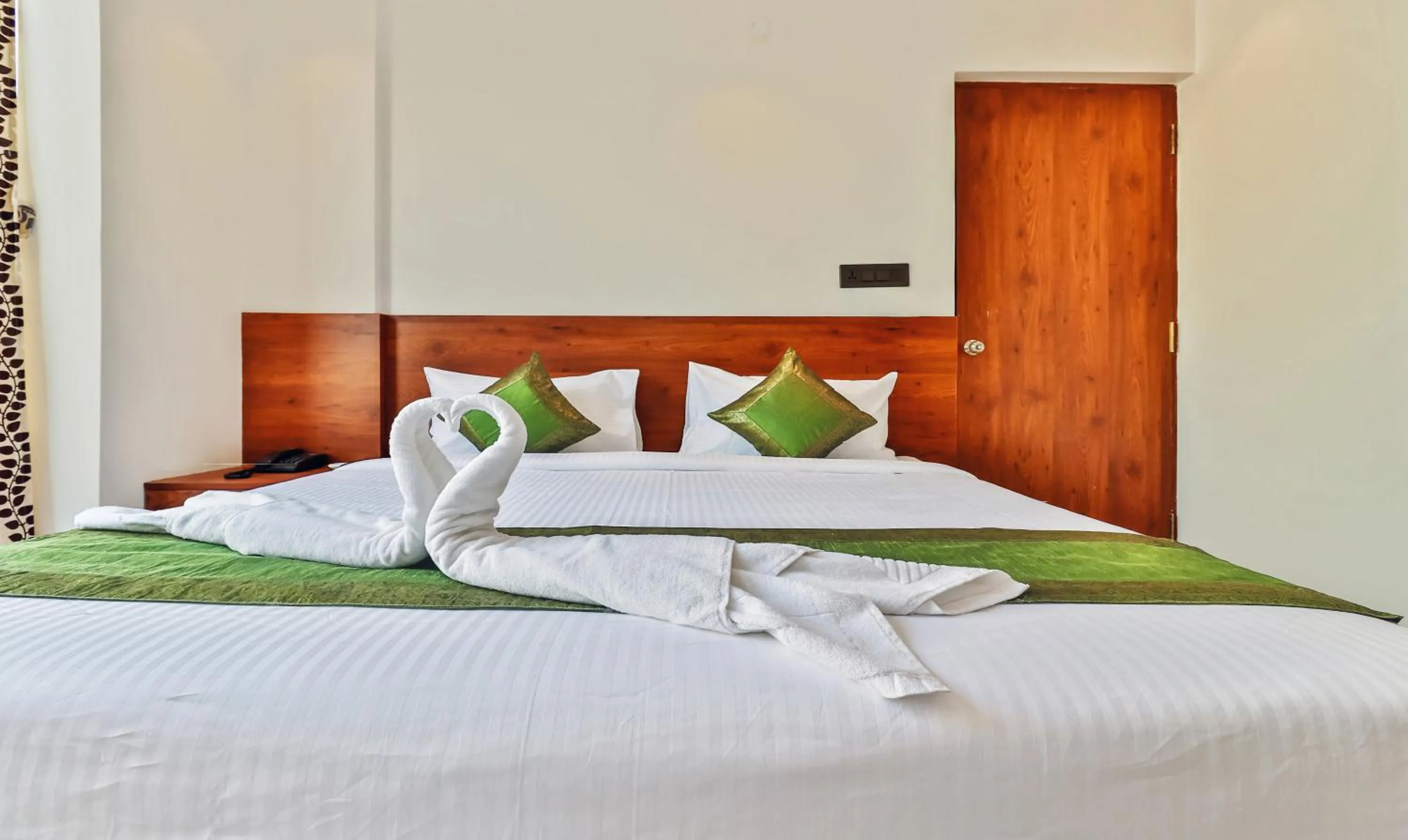 Bedroom, Bed in Treebo Blu Orchid