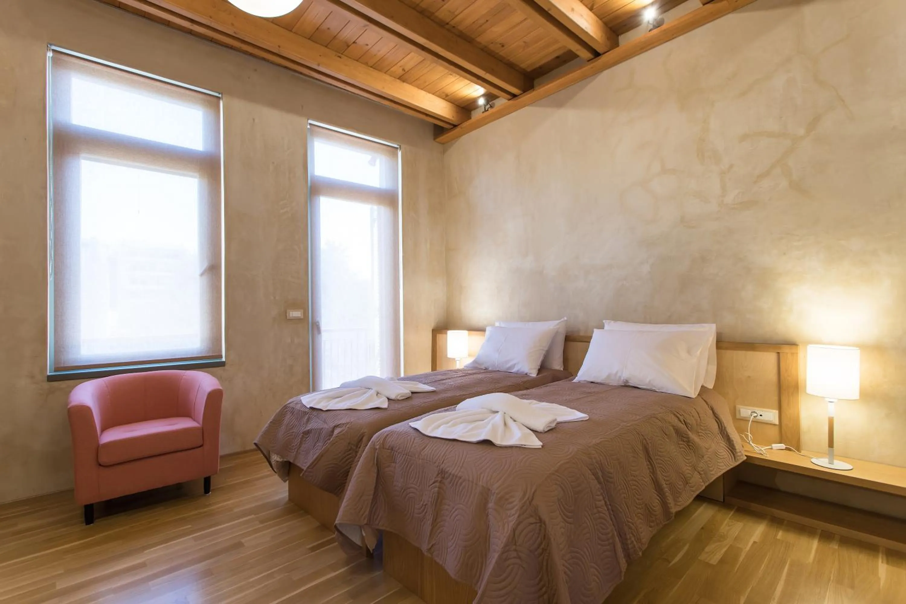 Bed in Polixeny's Suites