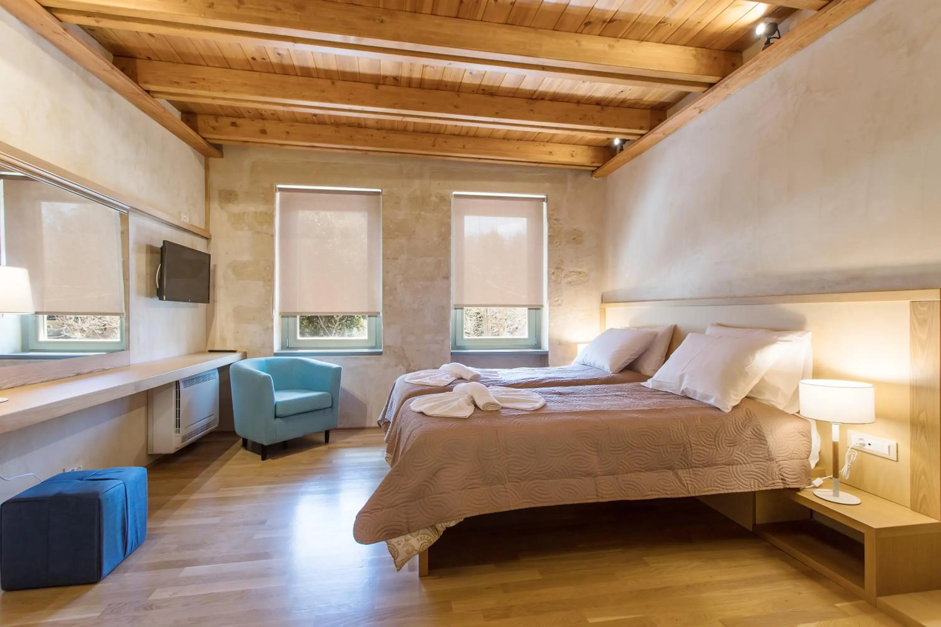 Bed in Polixeny's Suites