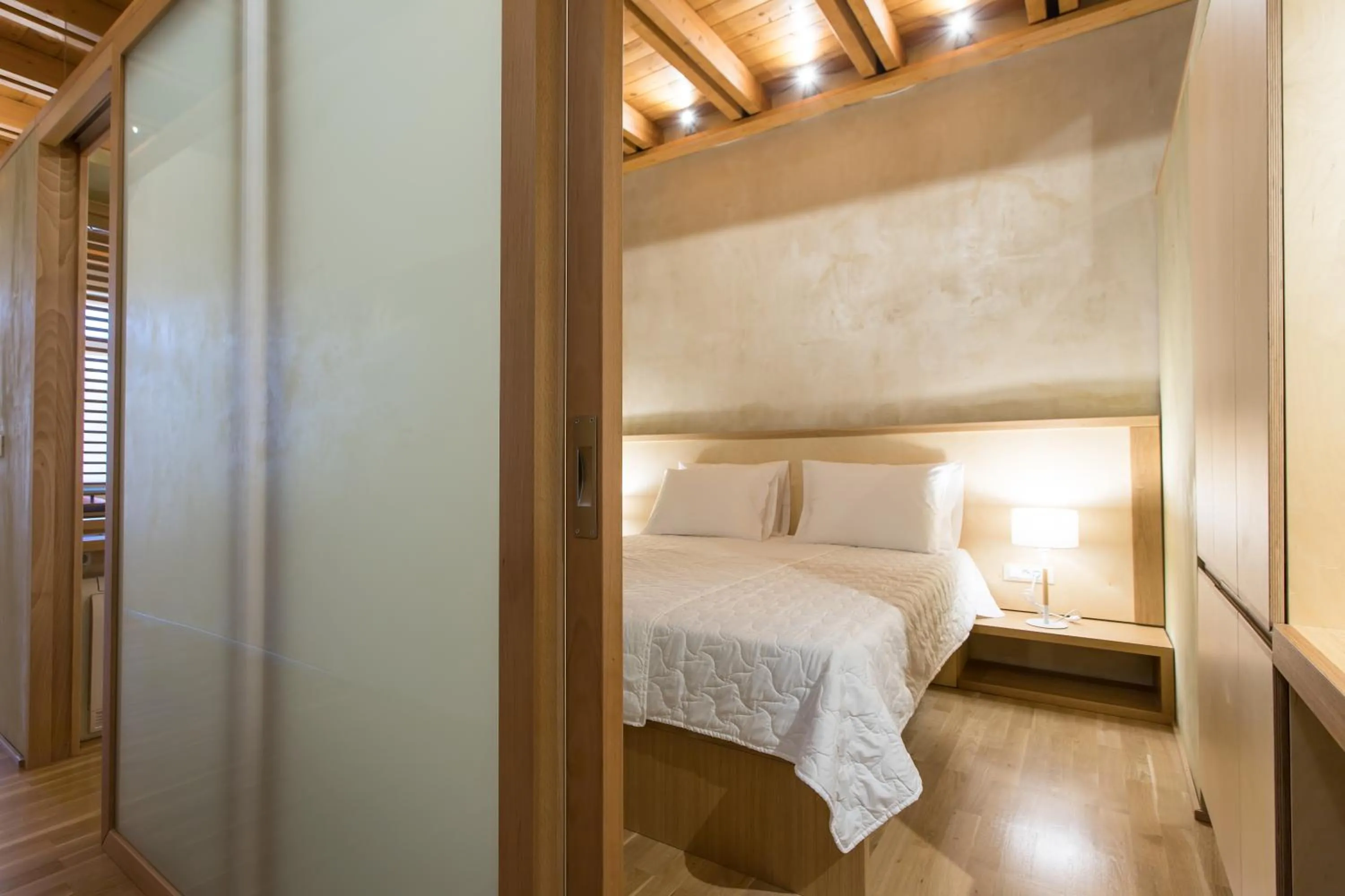 Bed in Polixeny's Suites