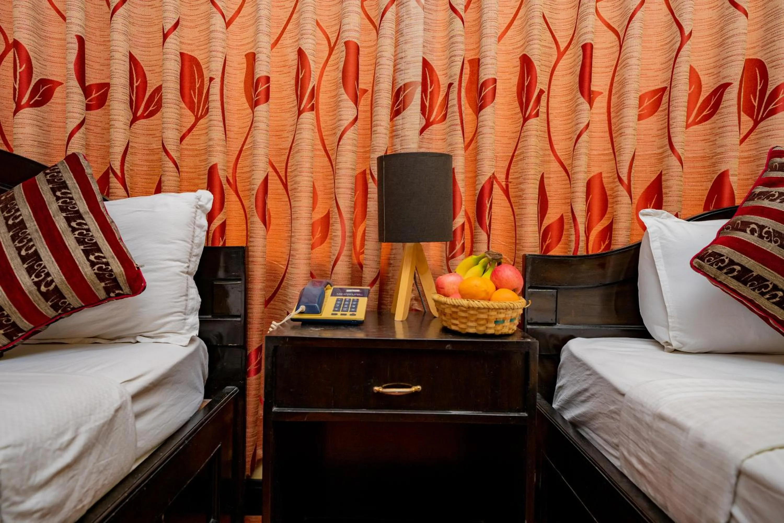 Bed in Hotel Bougainvillea