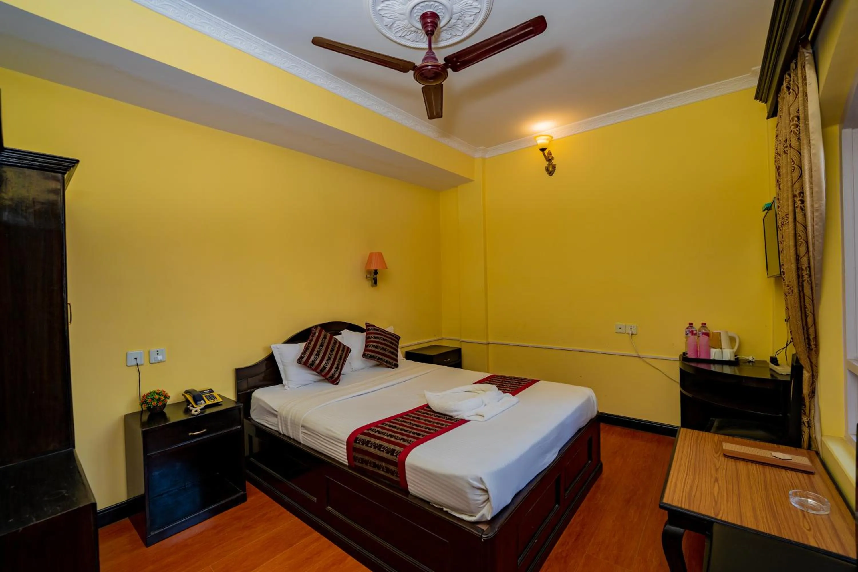 Bed in Hotel Bougainvillea