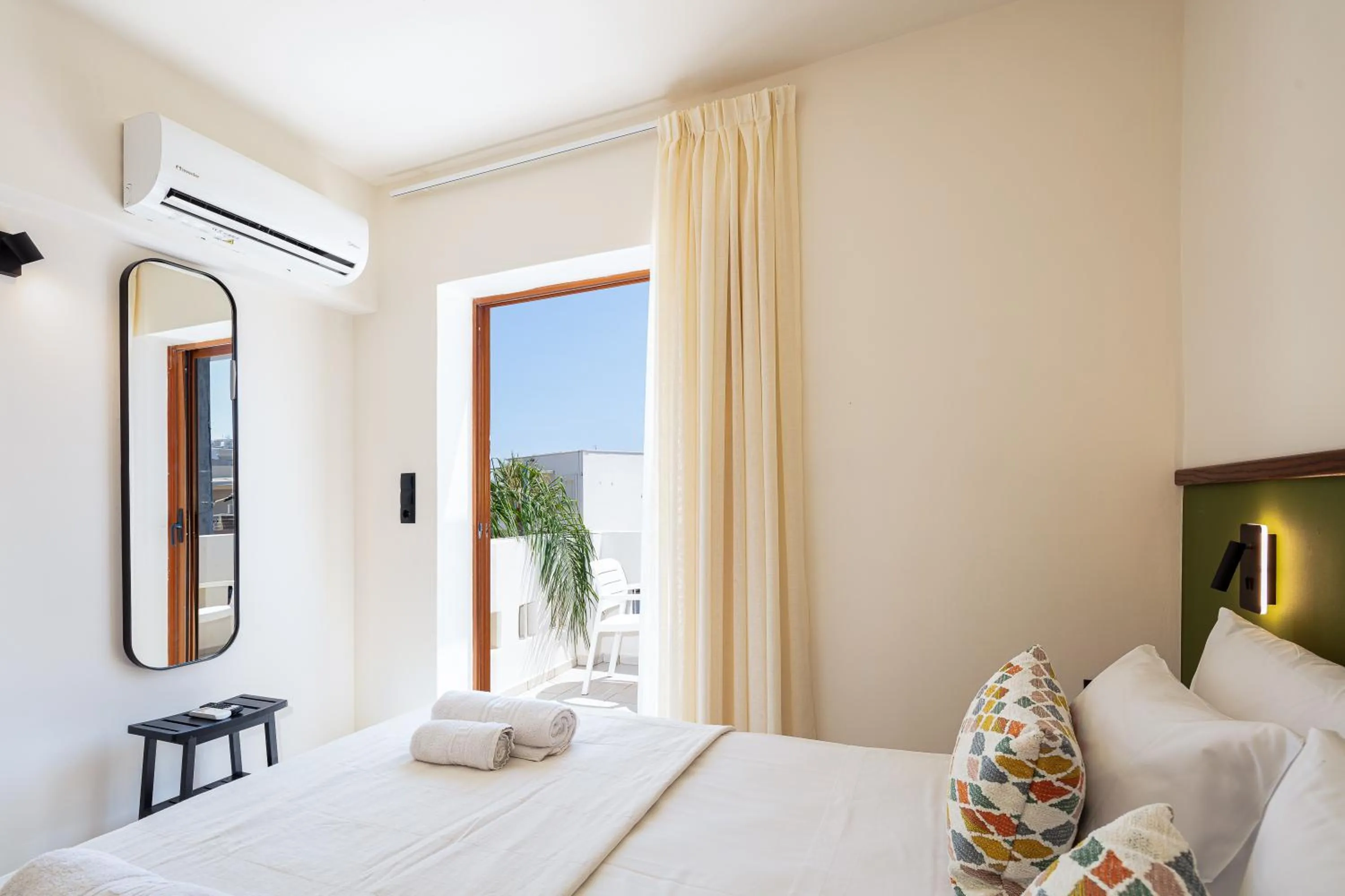 Bed in Aristea Hotel