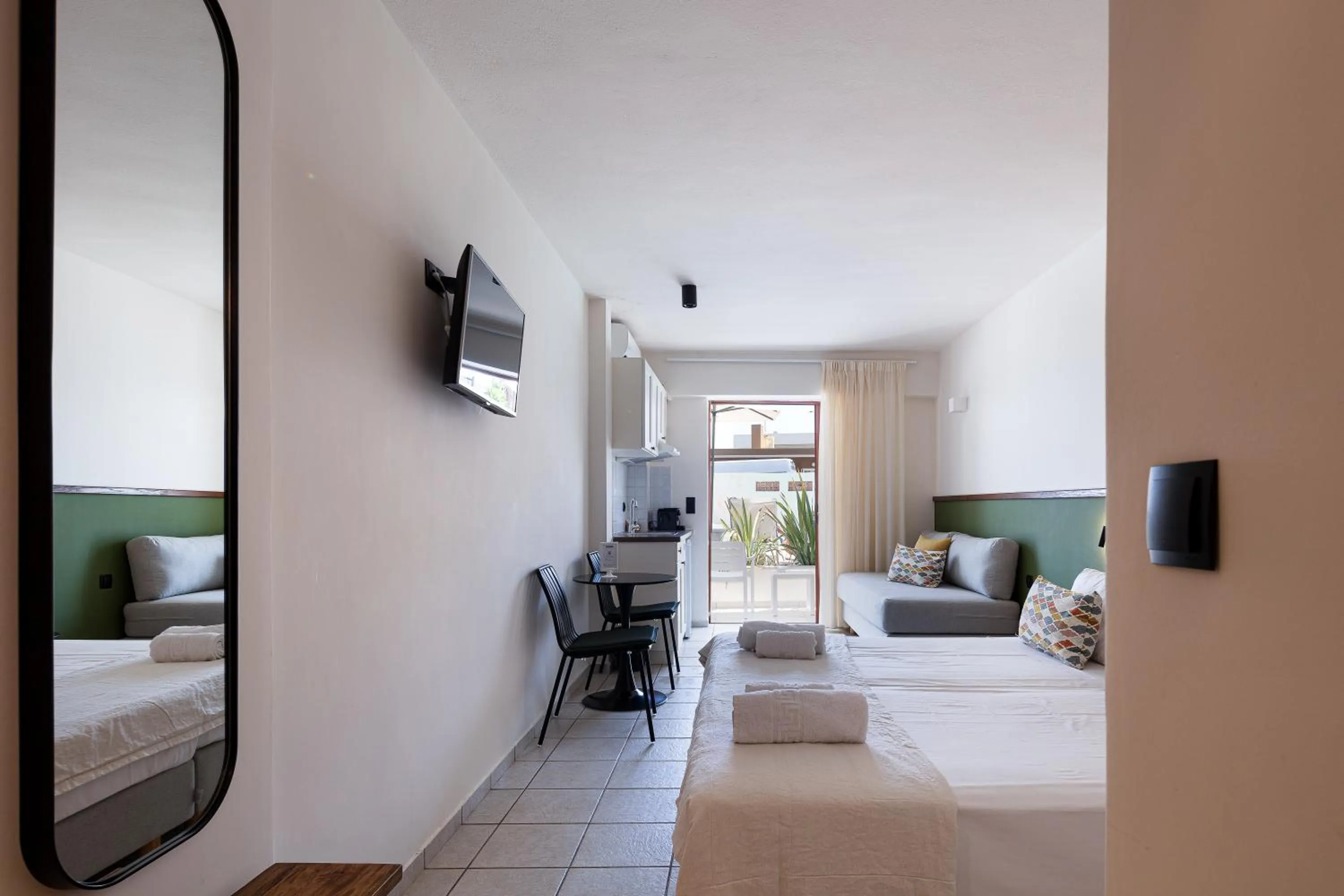 Bed in Aristea Hotel