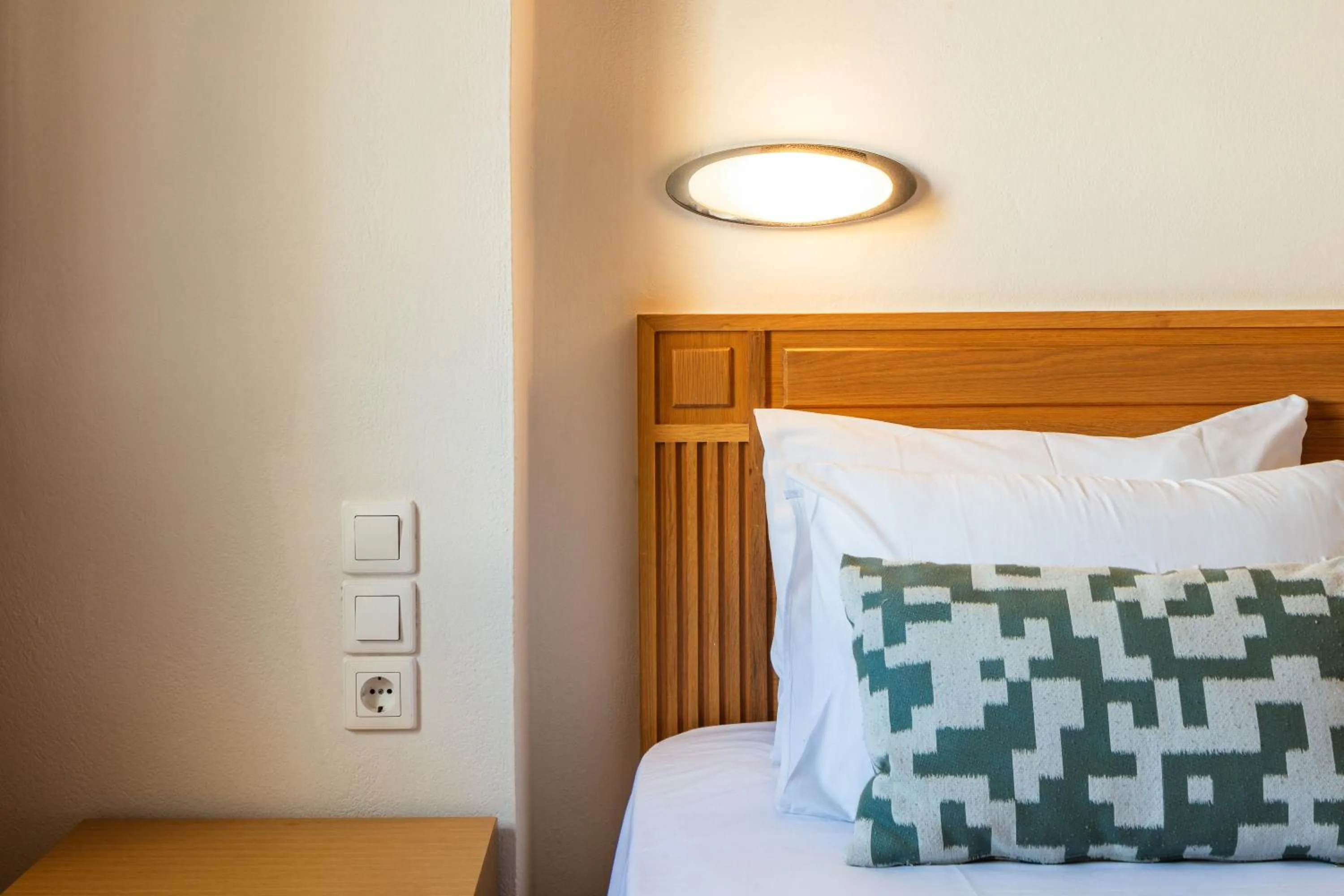 Bed in Aristea Hotel