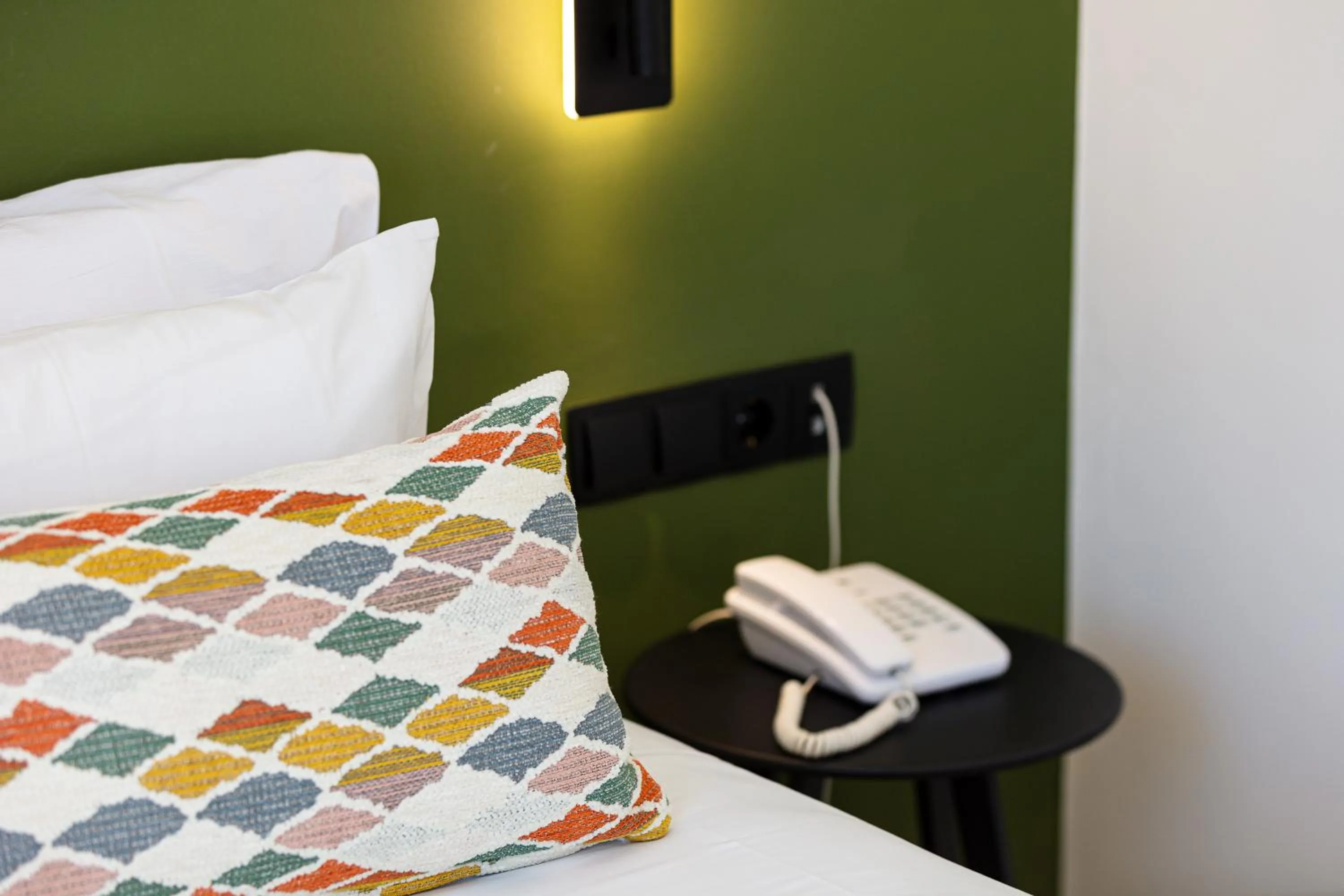 Bed in Aristea Hotel