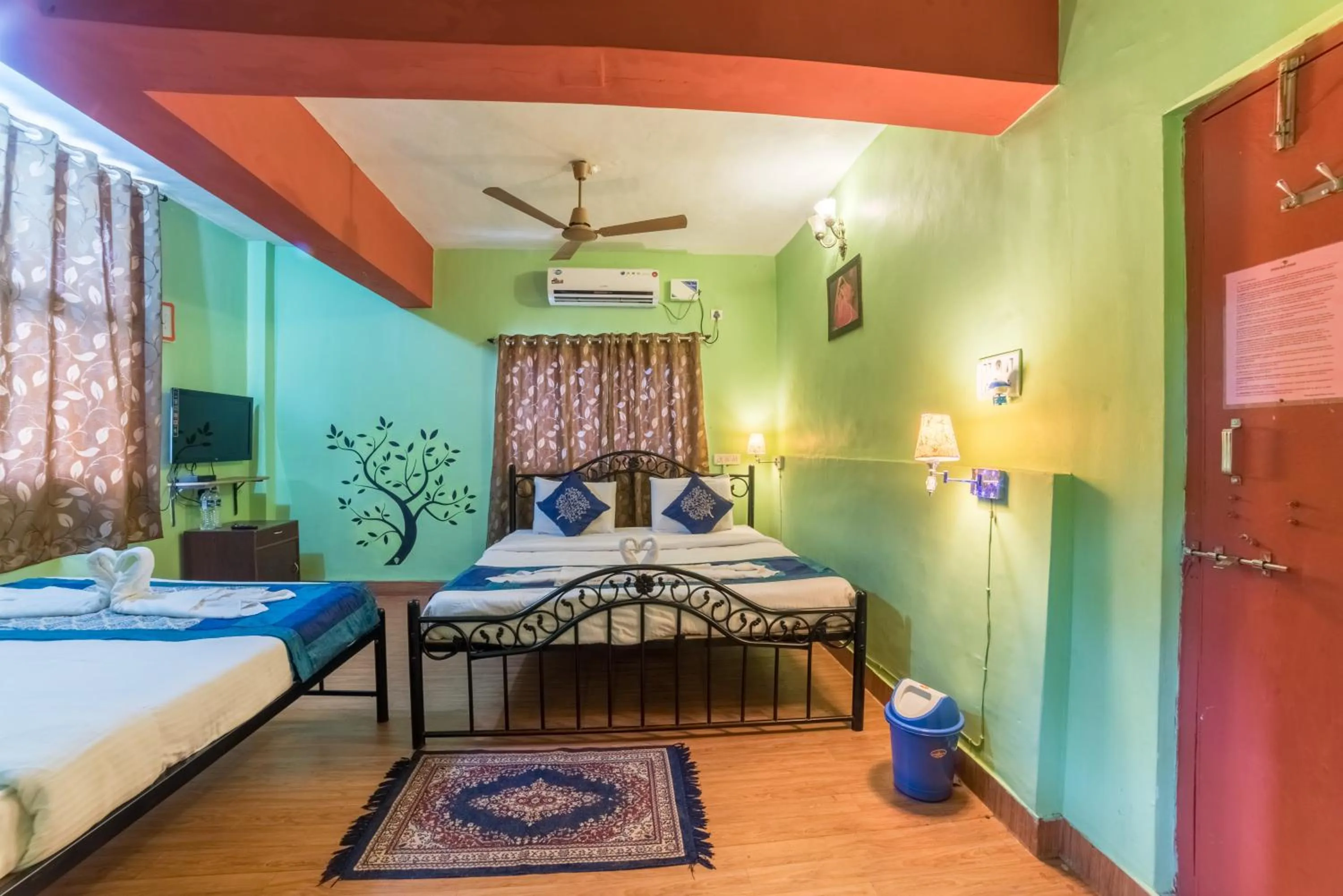 Bed in Kiara Hotel Goa