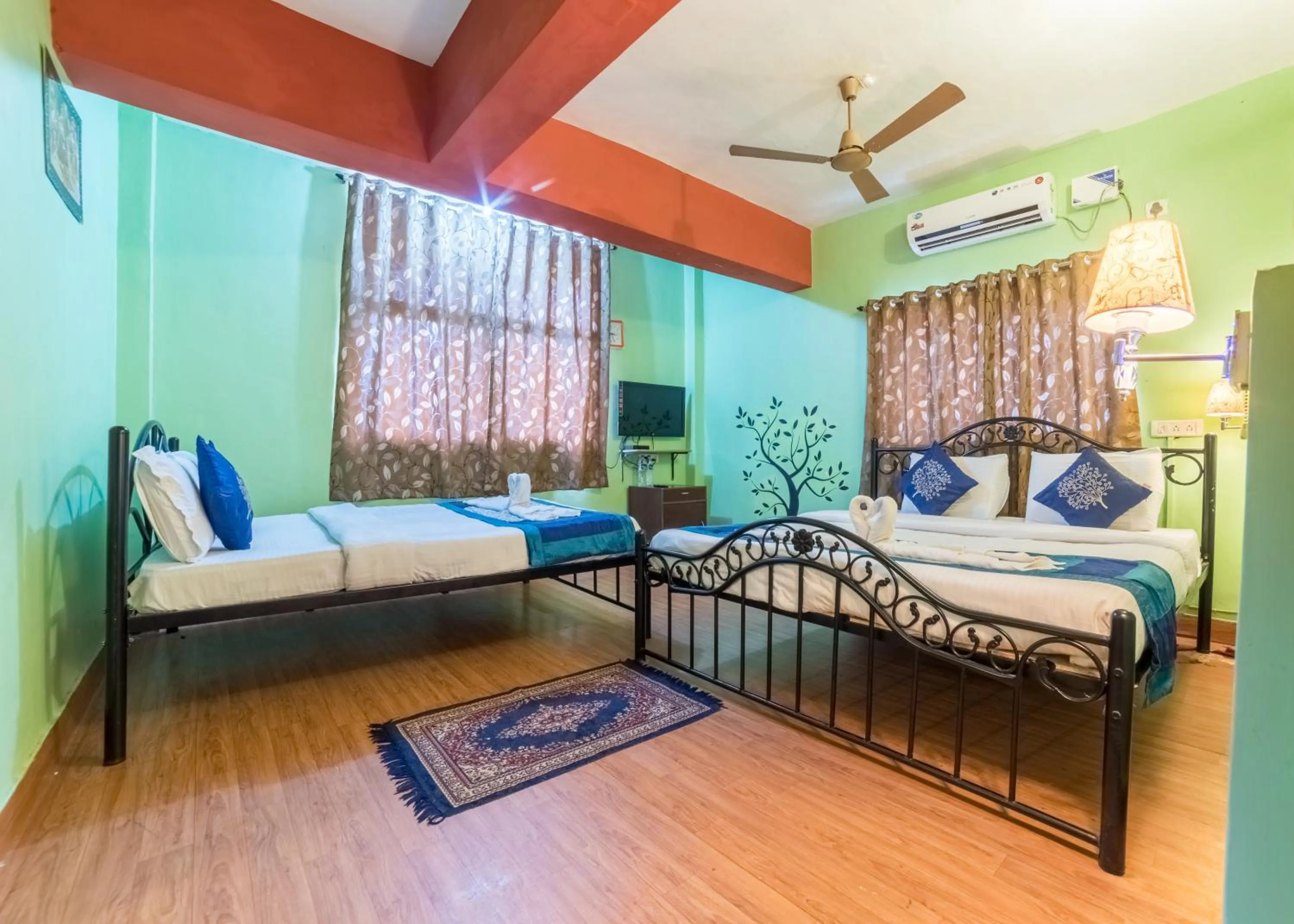 Bed in Kiara Hotel Goa