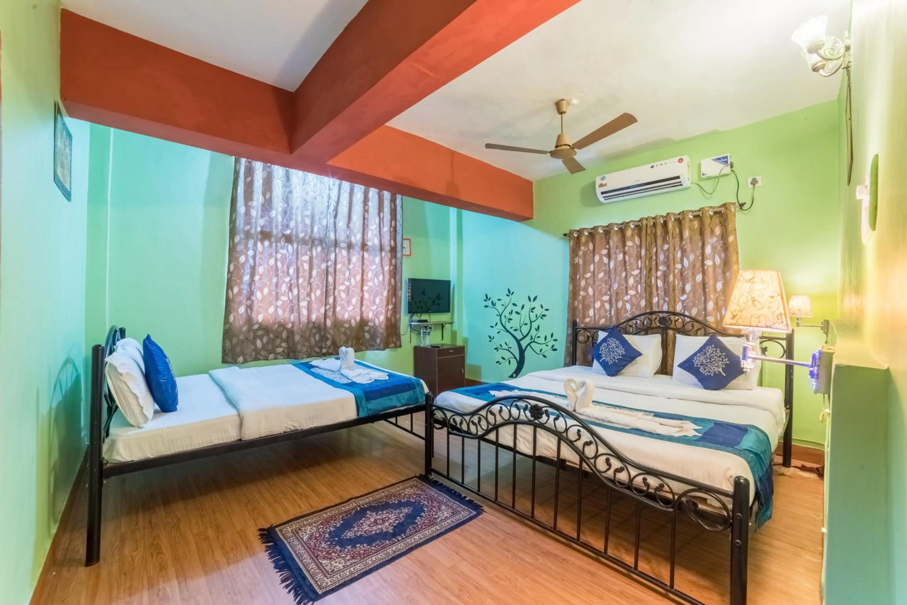 Bed in Kiara Hotel Goa