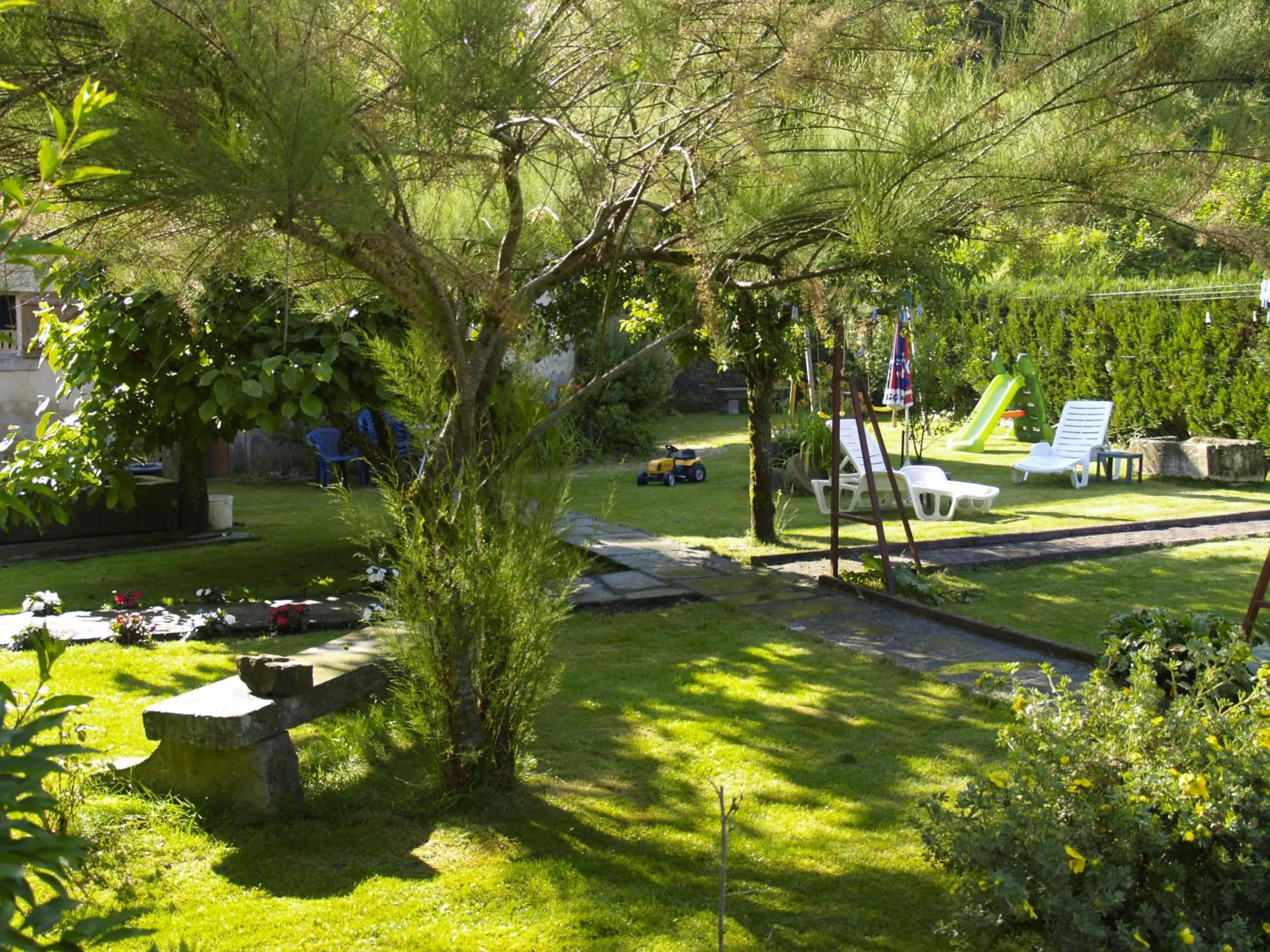 Garden in Chambres d'hôtes Résidence du Parc