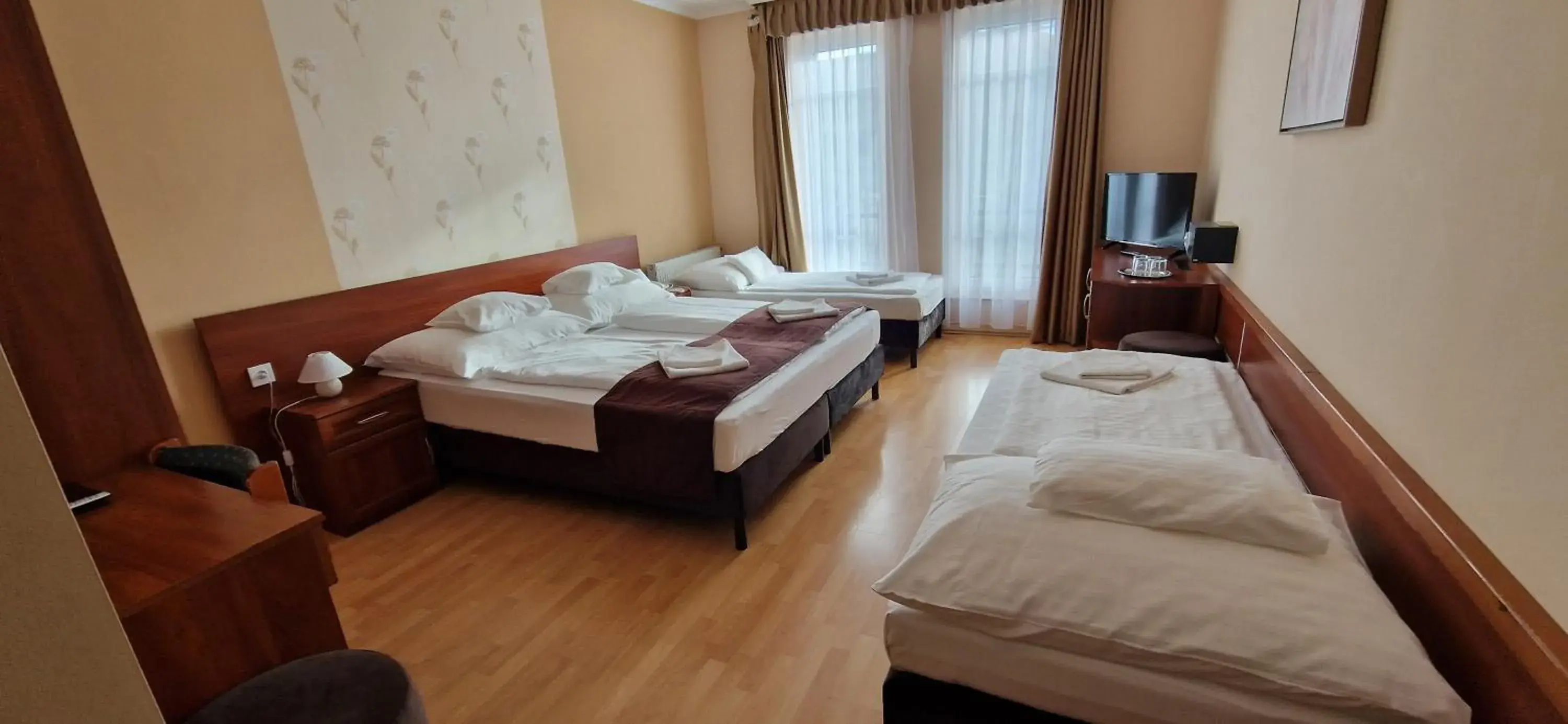 Quadruple Room in Hotel Patonai Quadruple Room in Hotel Patonai