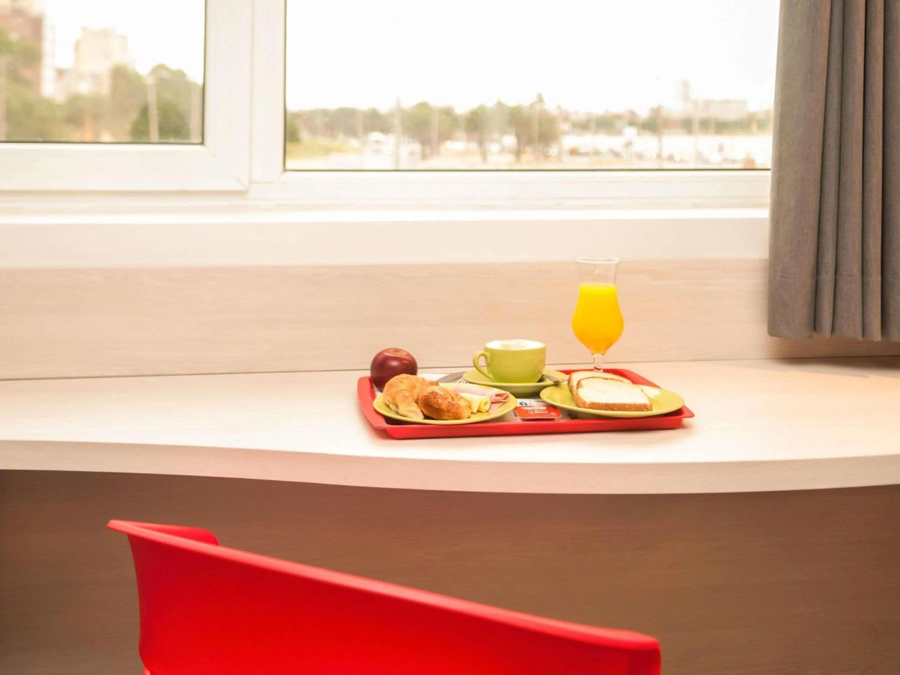 Bedroom in ibis Montevideo Rambla