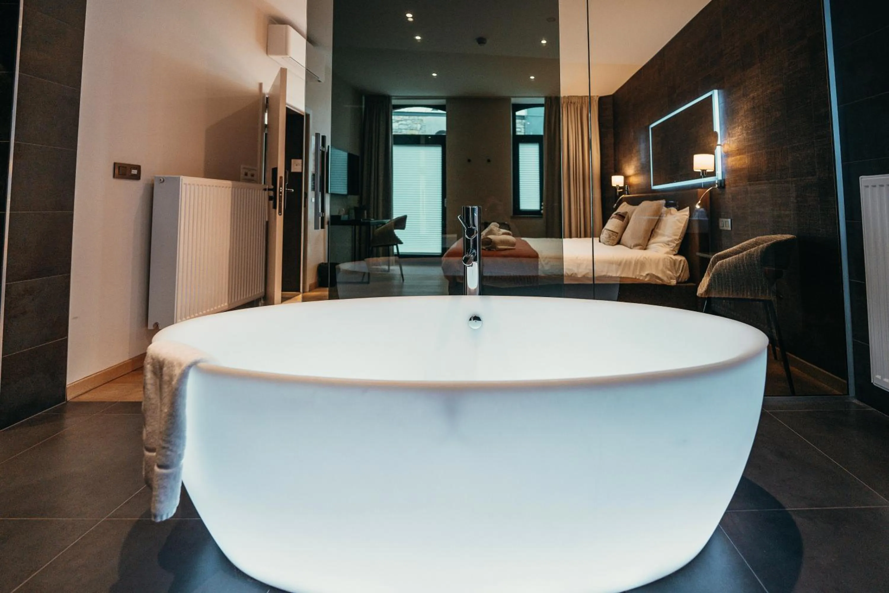 Bedroom in Hôtel Le Manoir