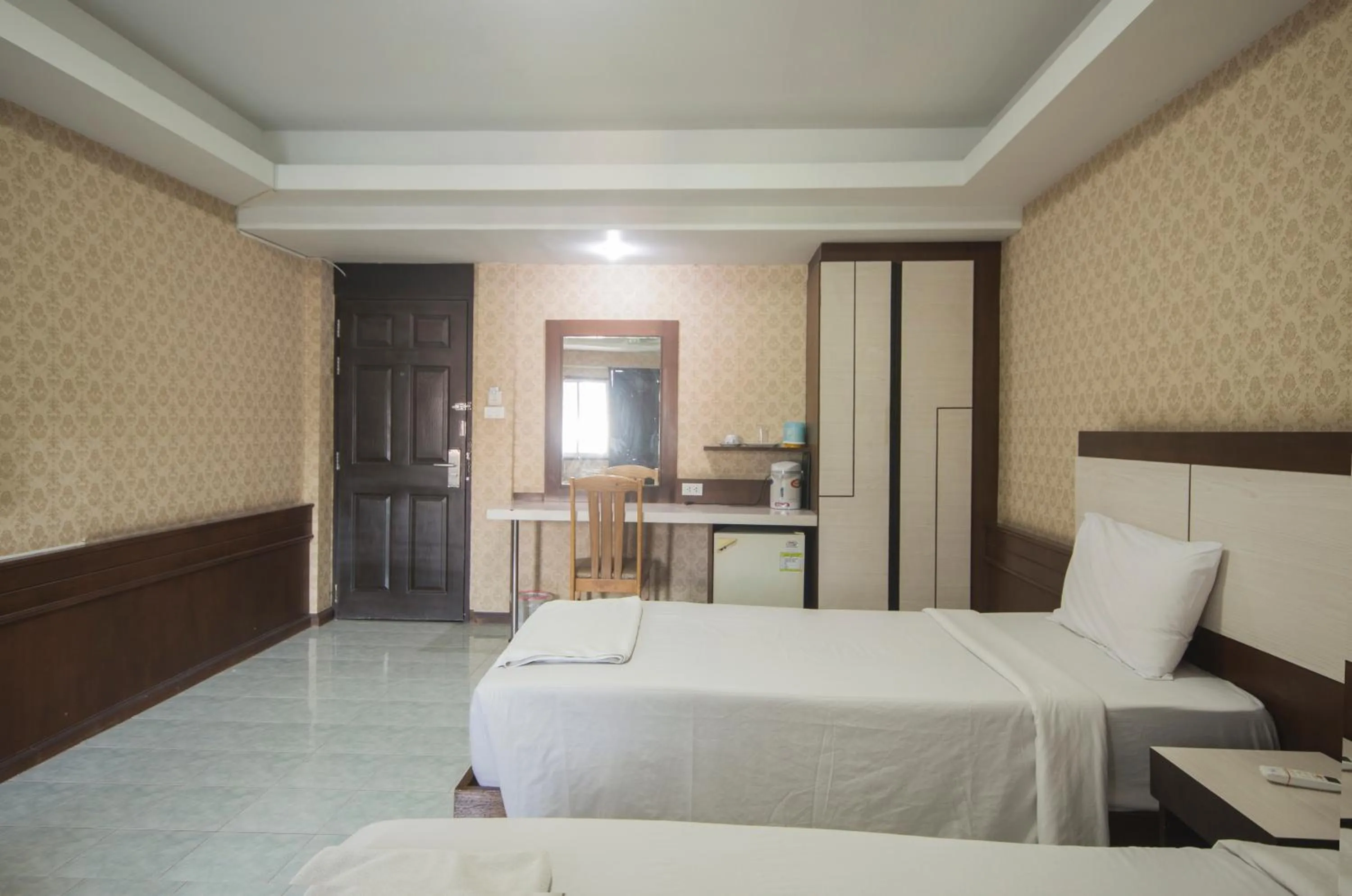 Bed in Khon Kaen Ruenrom Hotel