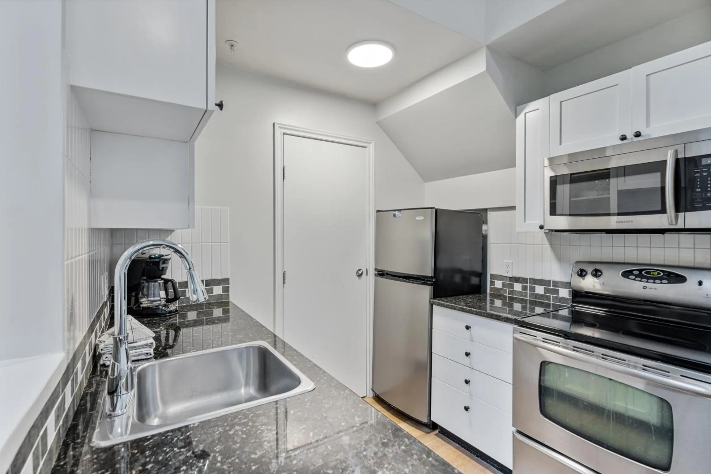 kitchen in Glaciers Reach by Allseason Vacation Rentals