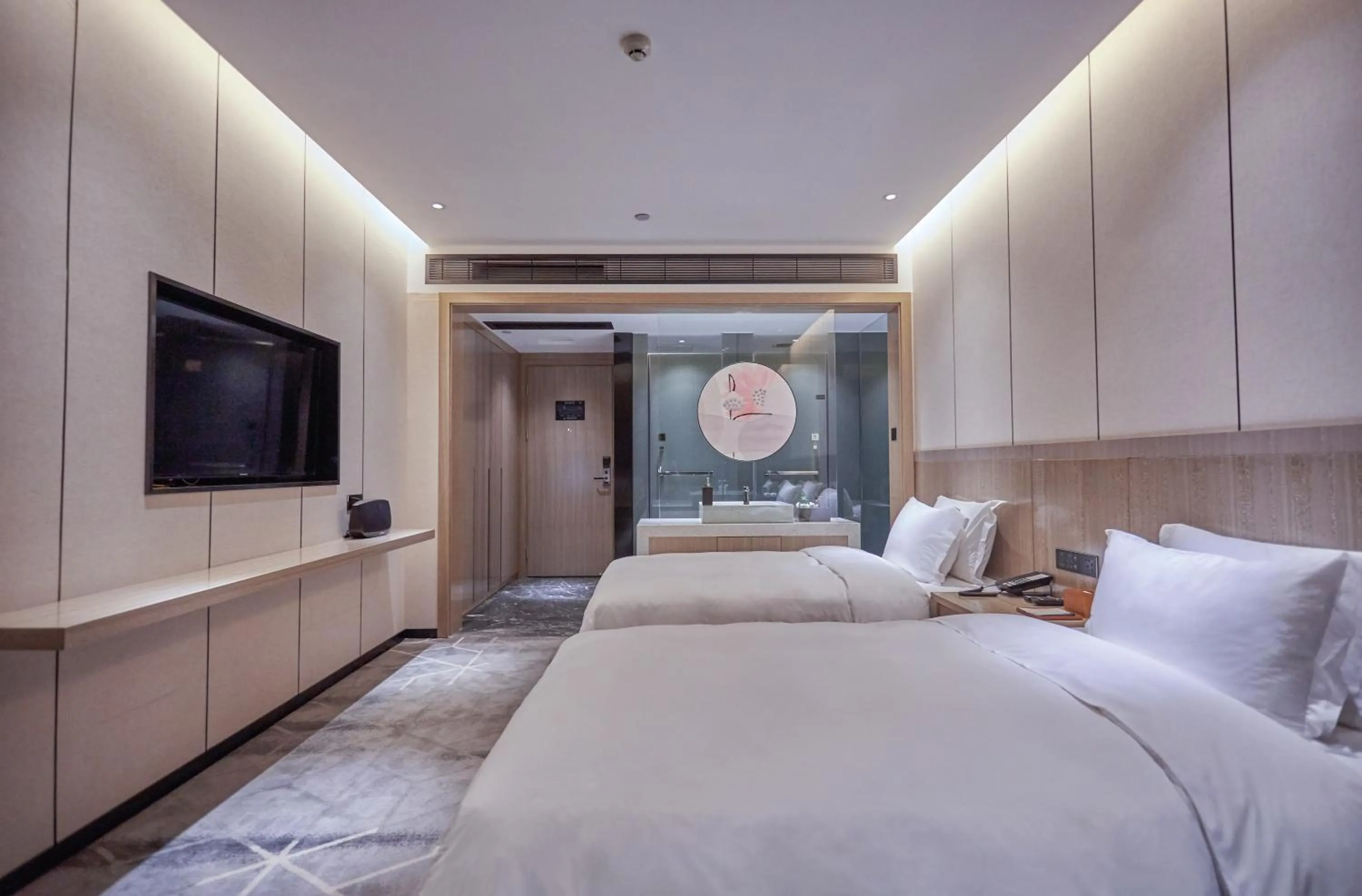Photo of the whole room, Bed in Paco Hotel Guangzhou Baiyun Airport Liantang Metro