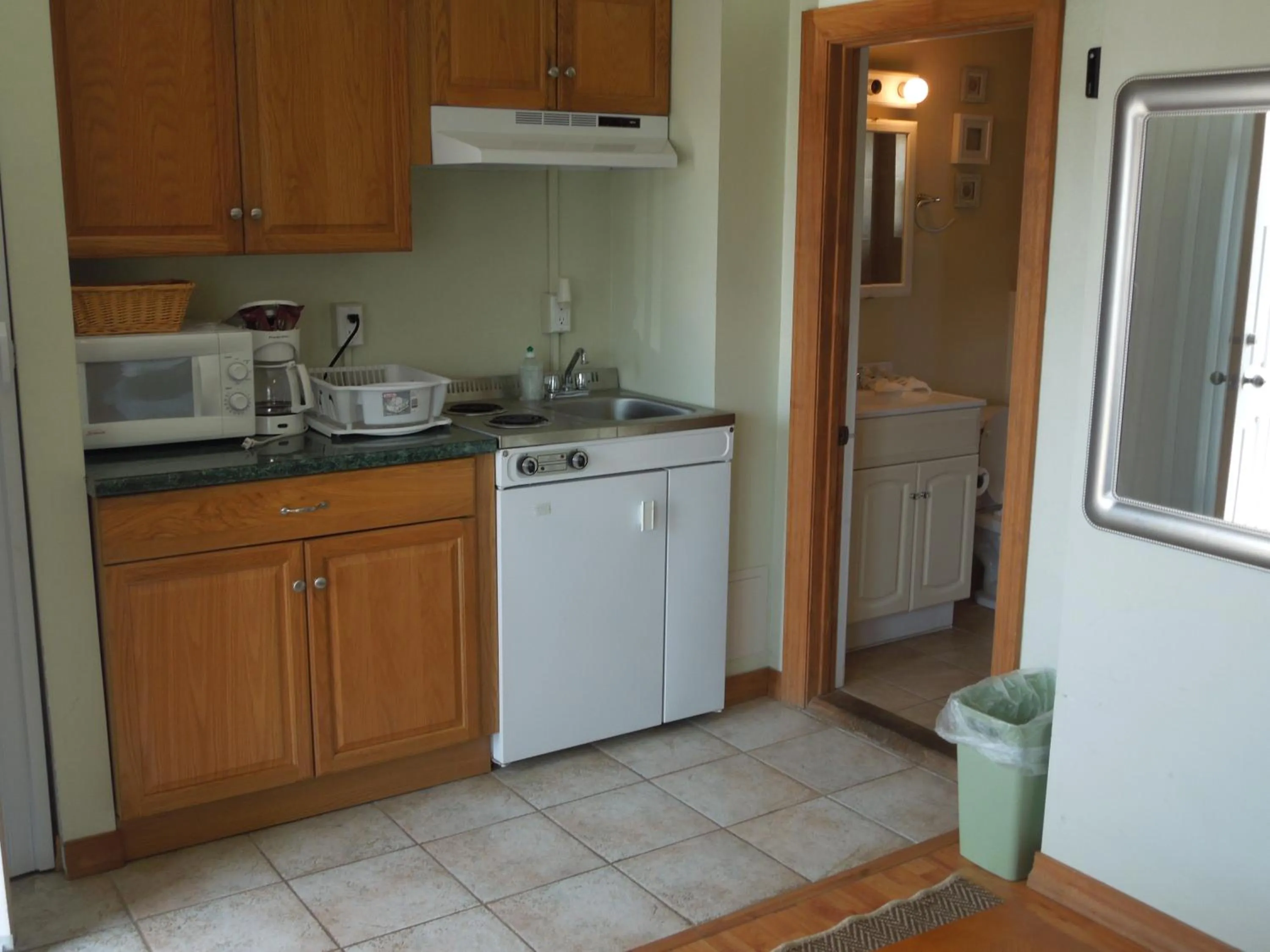 Kitchen or kitchenette in Sifting Sands Motel
