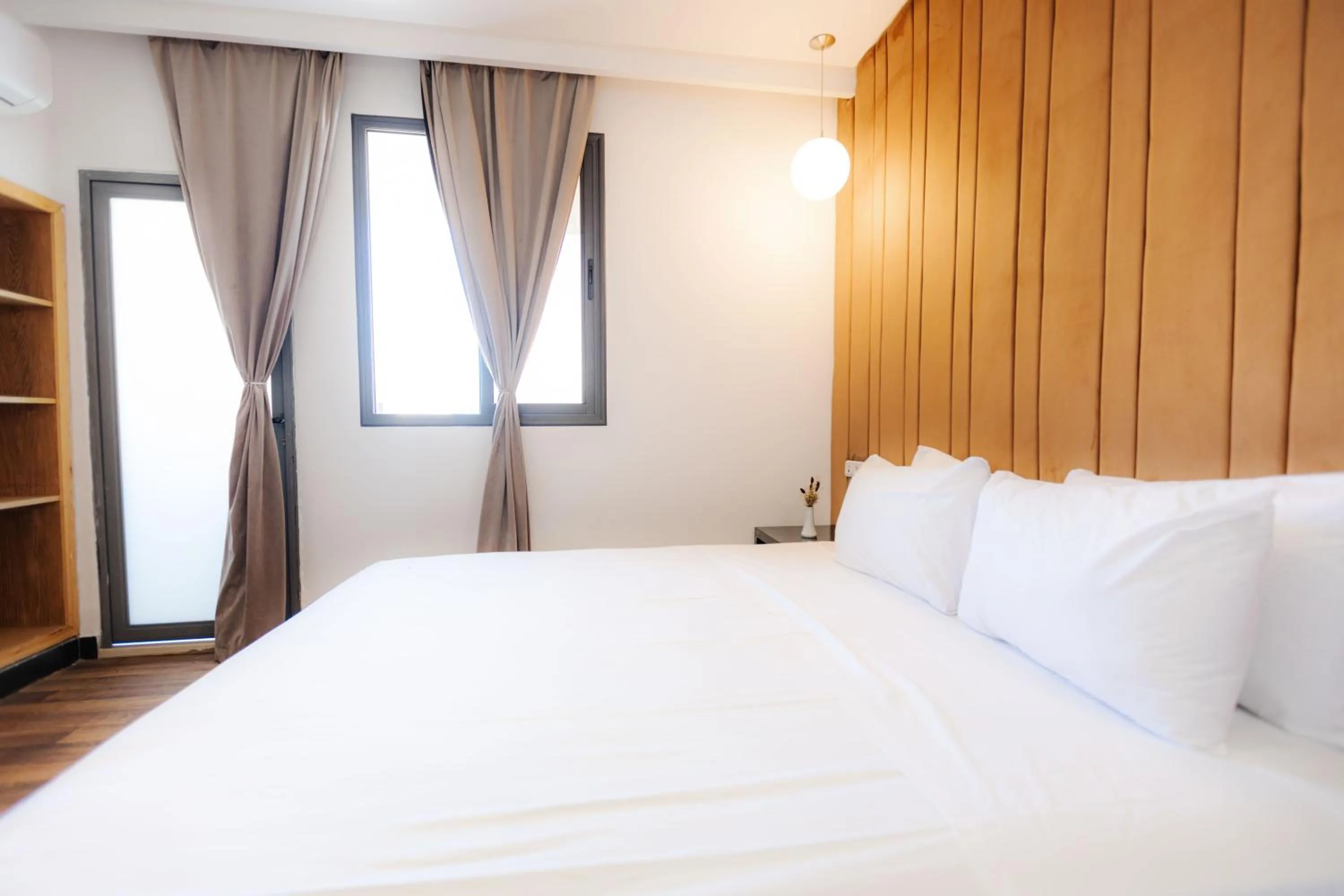 Bed in WINDSOR HOTEL CITY CENTER