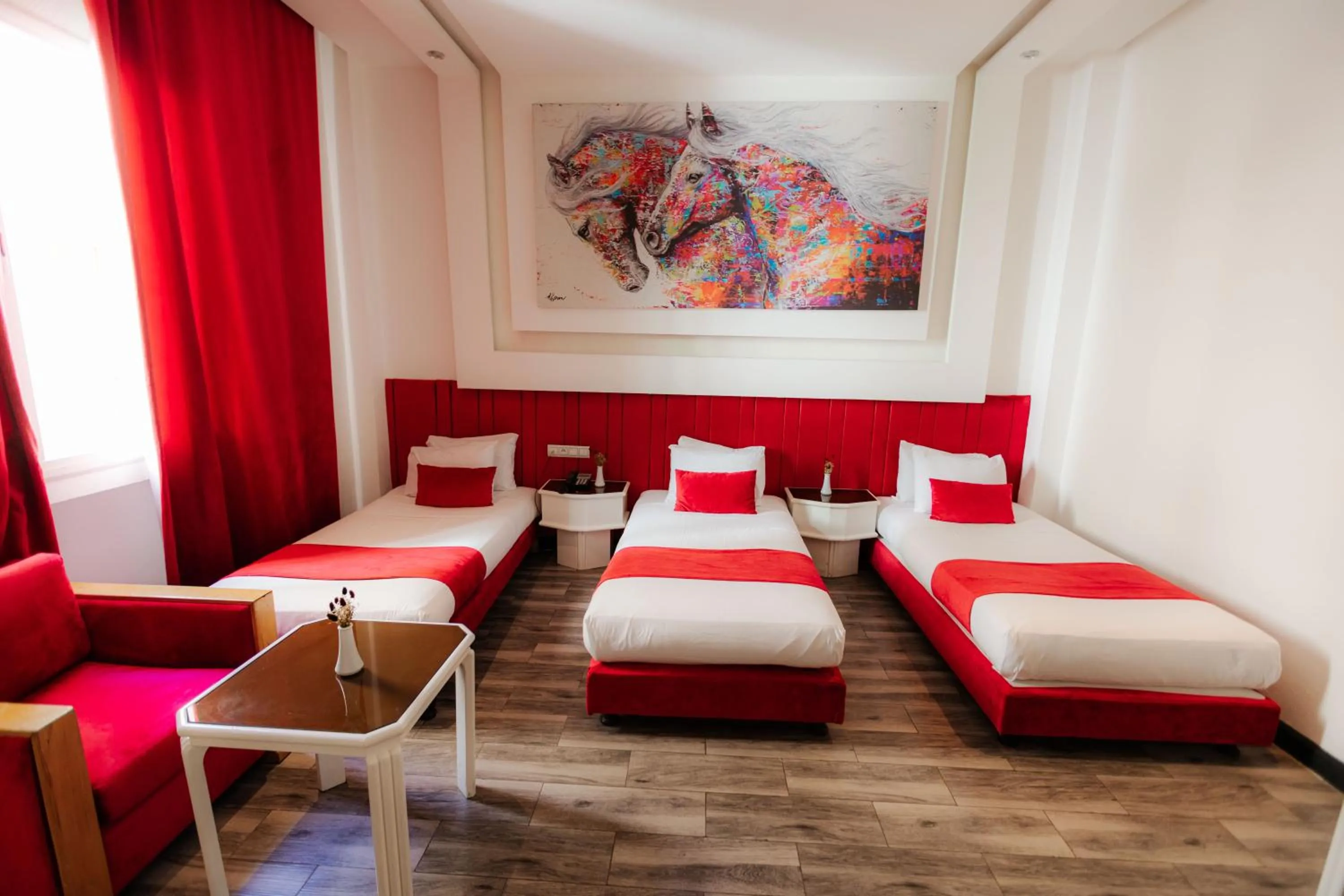 Bed in WINDSOR HOTEL CITY CENTER