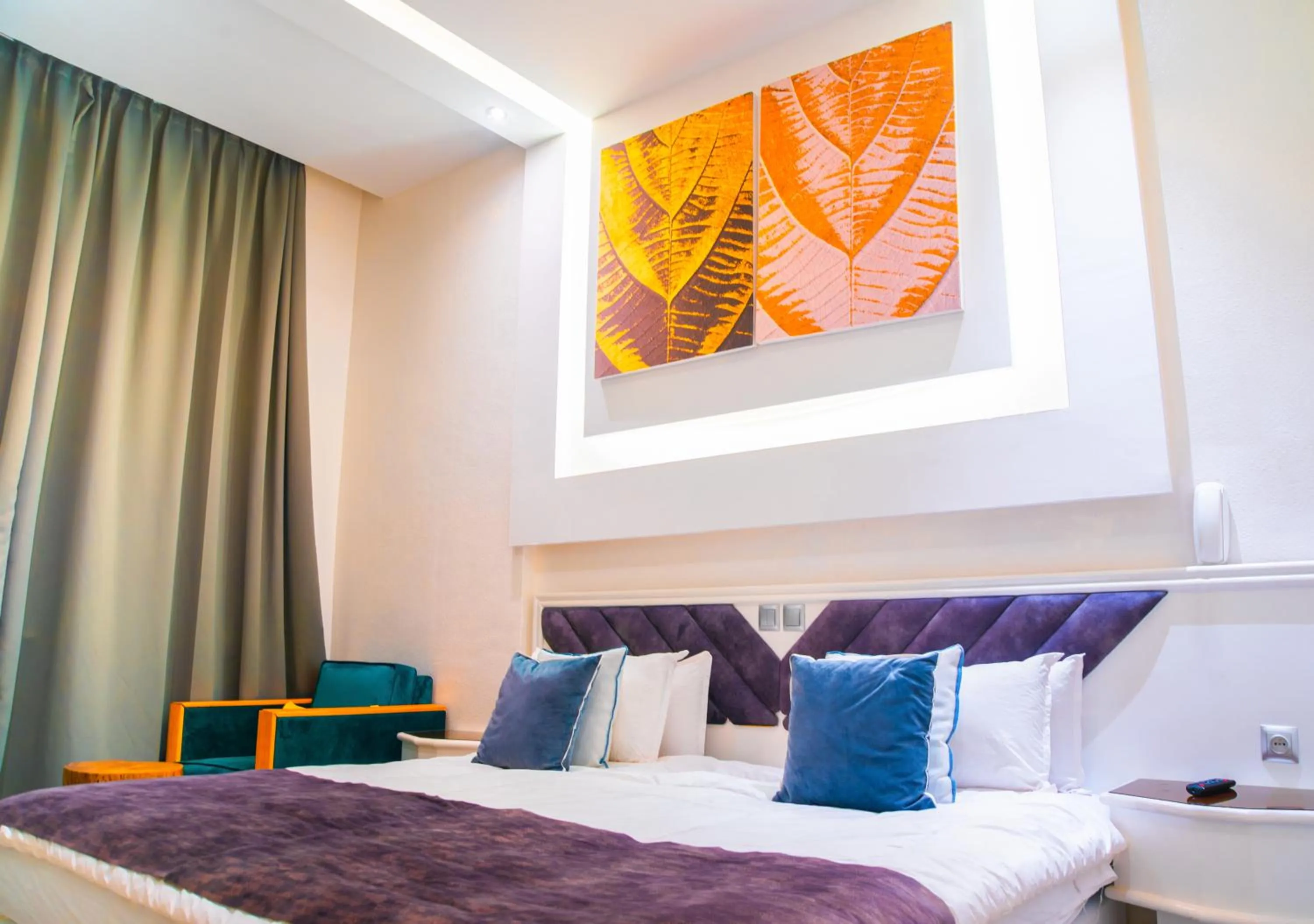 Bed in WINDSOR HOTEL CITY CENTER