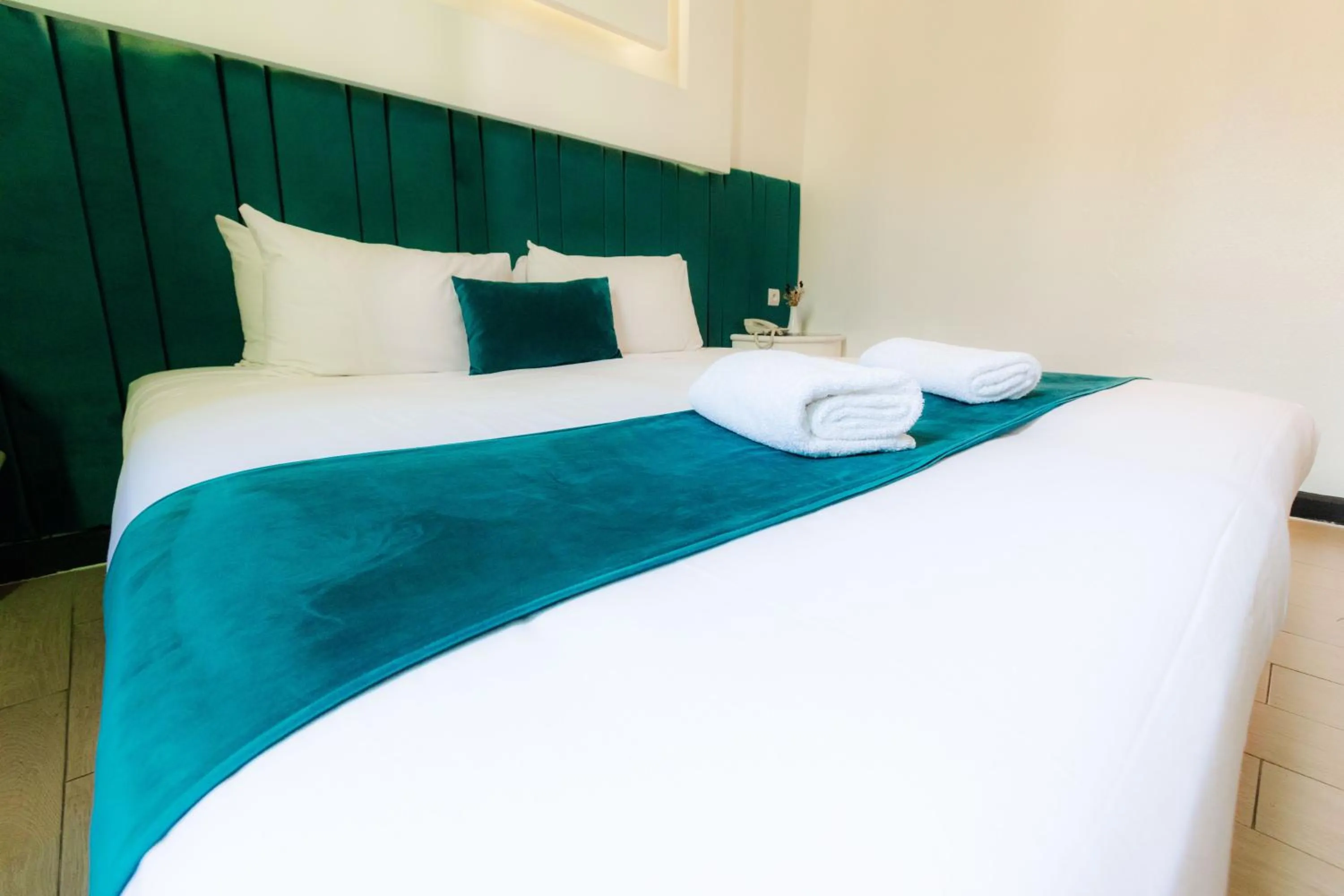 Bed in WINDSOR HOTEL CITY CENTER