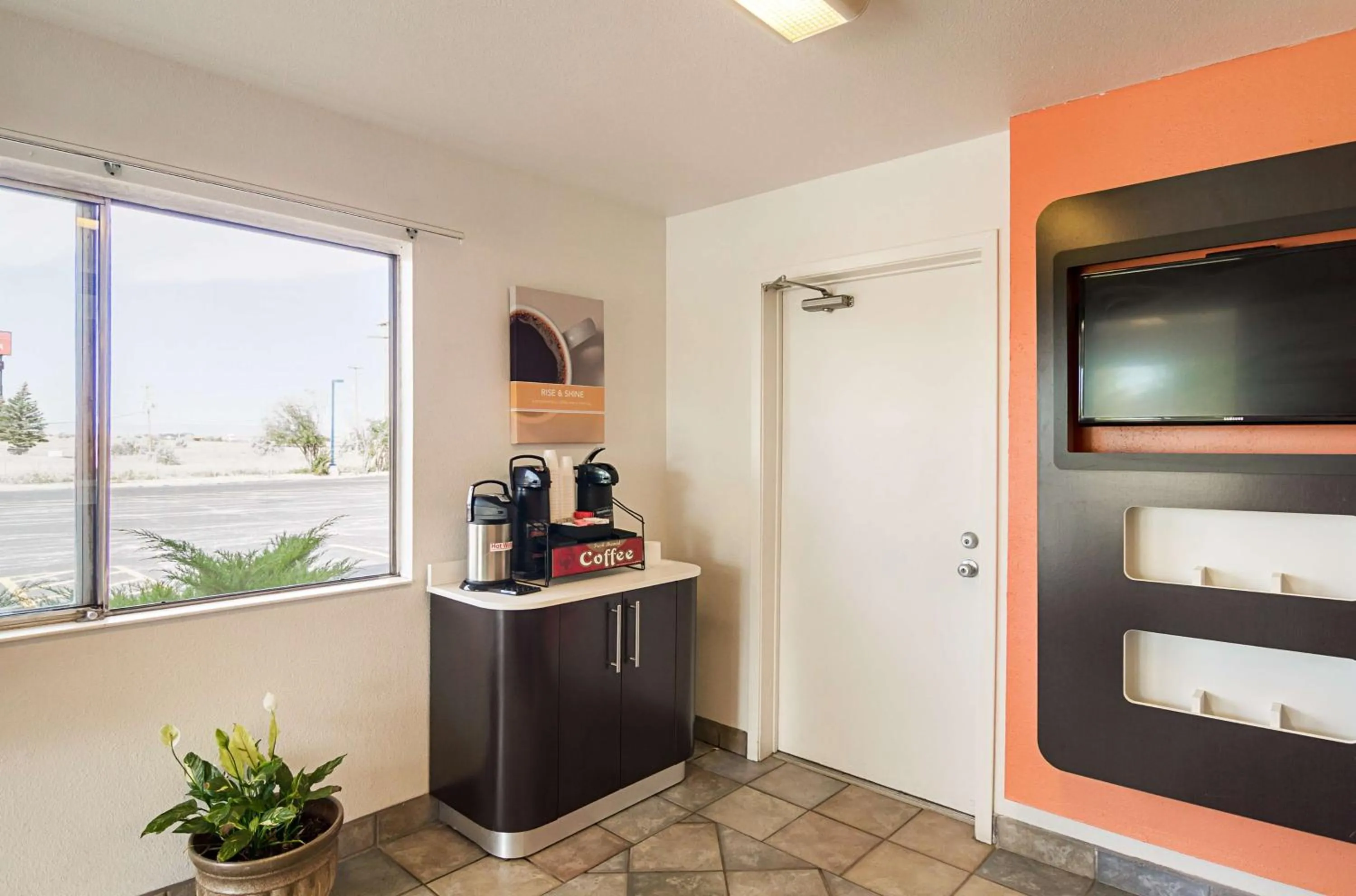 Communal lounge/ TV room in Motel 6-Laramie, WY